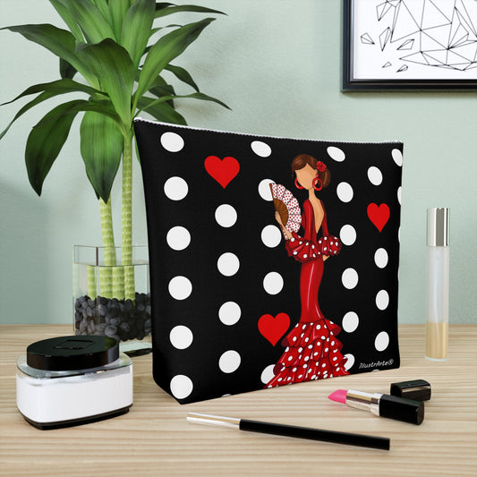 Neceser Flamenca 'Pepa' con diseño a doble cara en fondo negro con lunares blancos, ideal para viajes y aseo femenino.