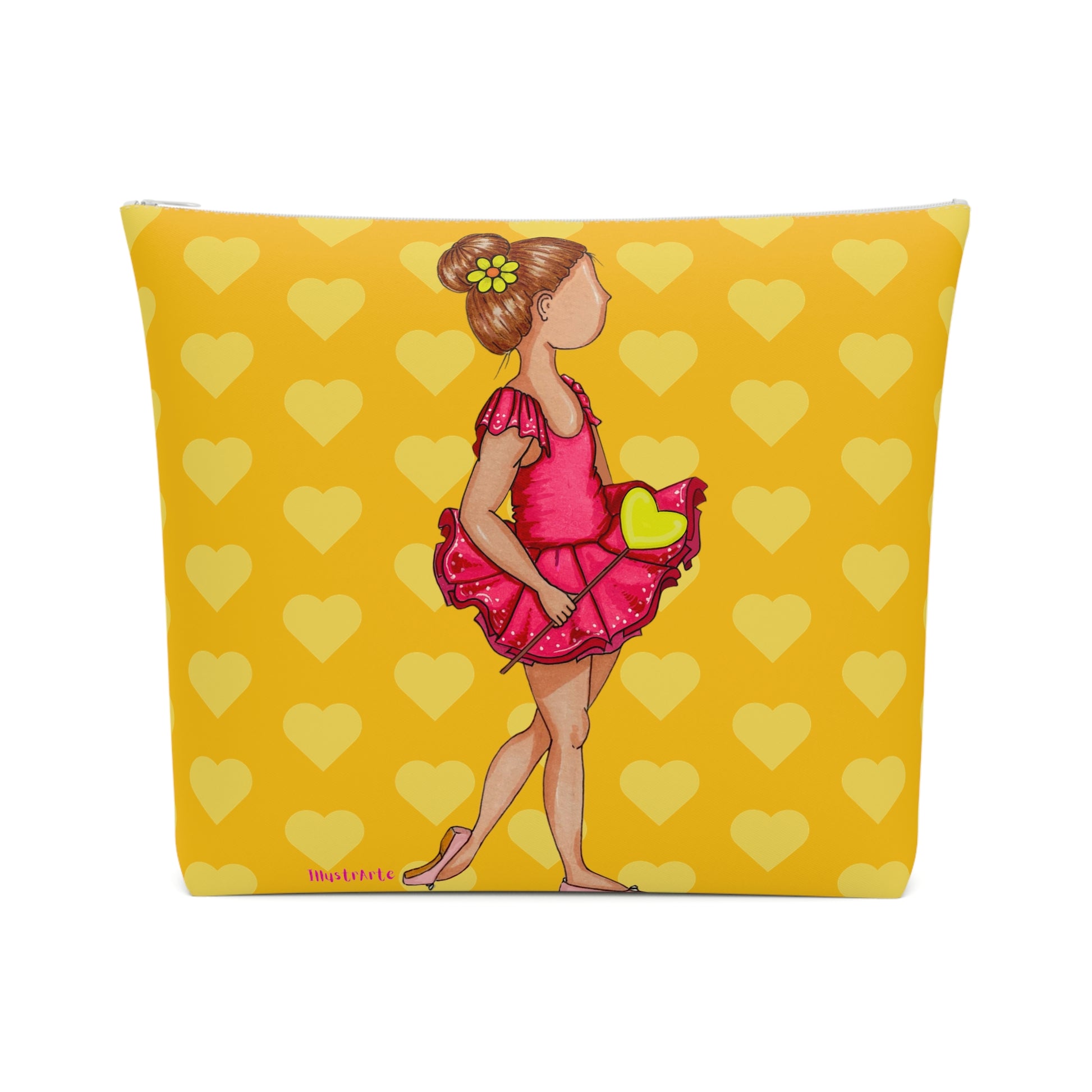 a yellow pillow with a picture of a little girl in a pink dress