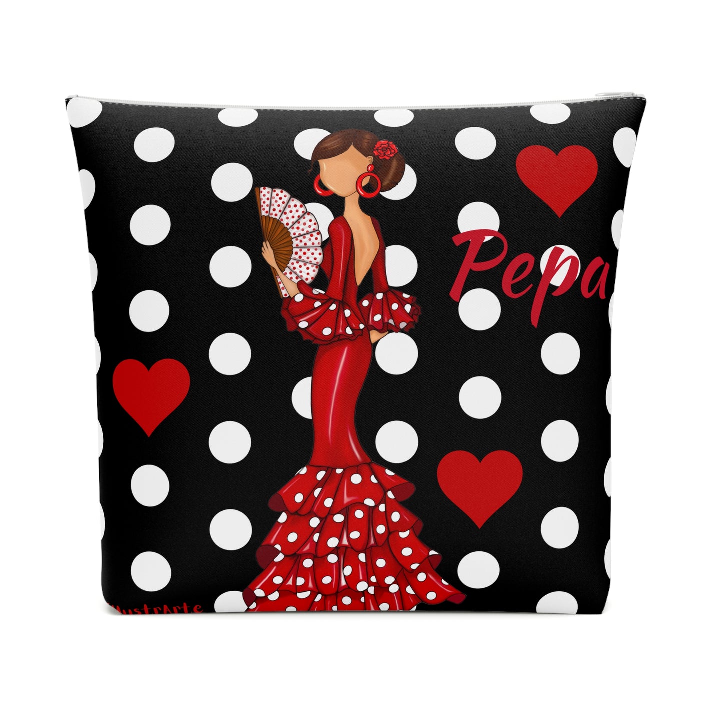 una almohada de lunares en blanco y negro con una mujer en un vestido rojo sosteniendo un