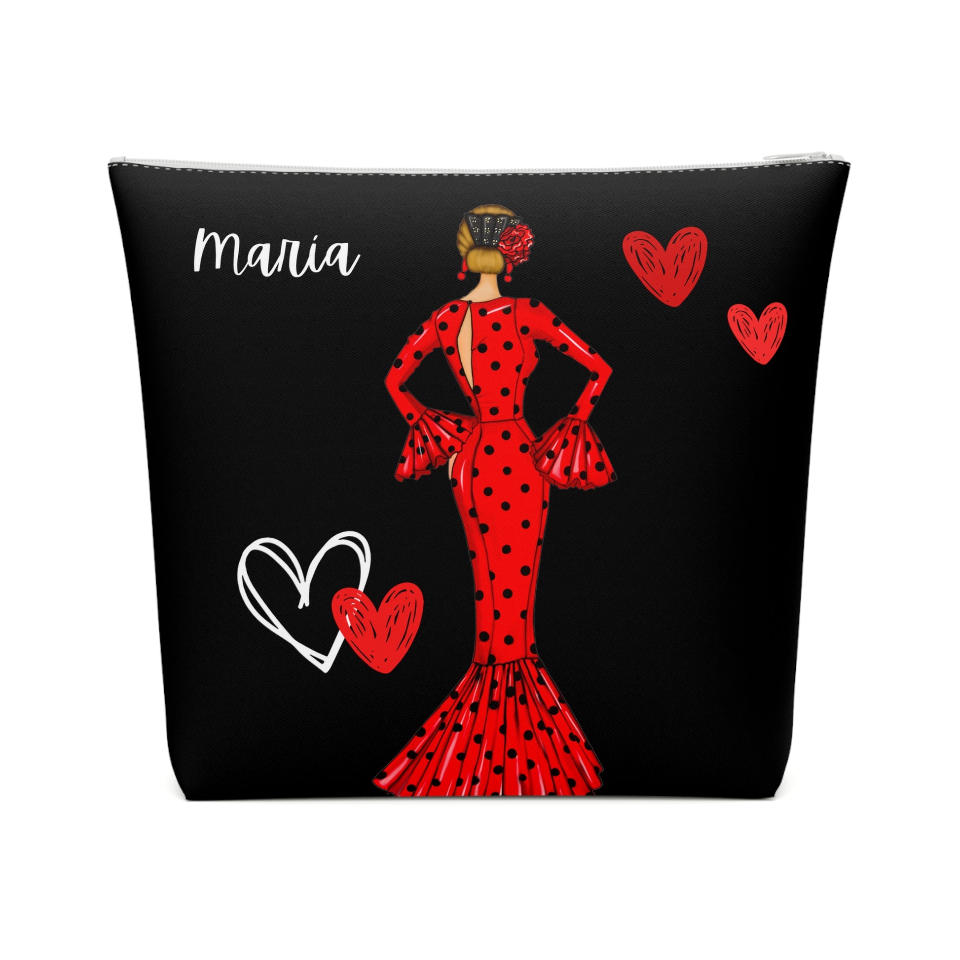 a woman in a red dress with hearts on a black background