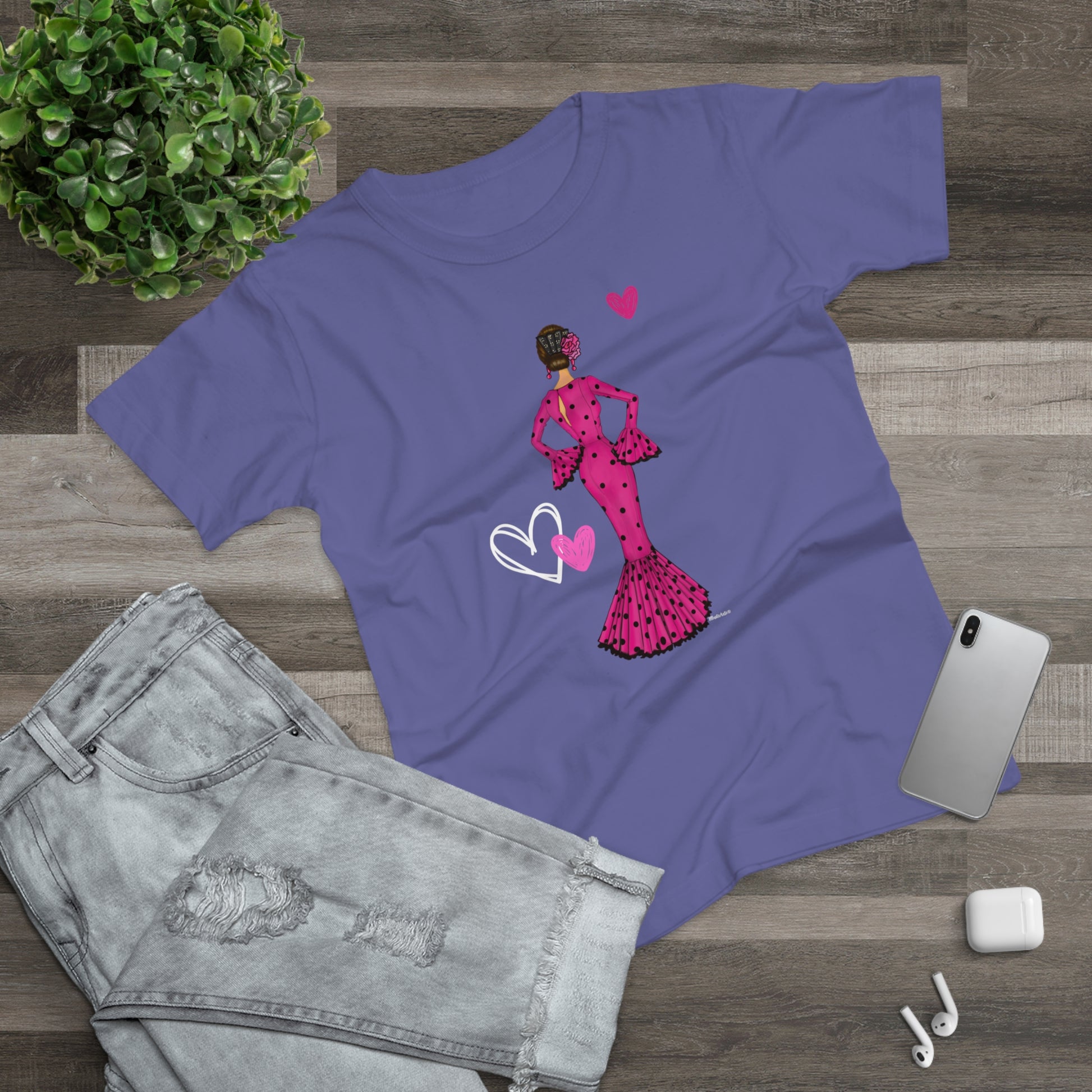 a t - shirt with a picture of a woman in a pink dress