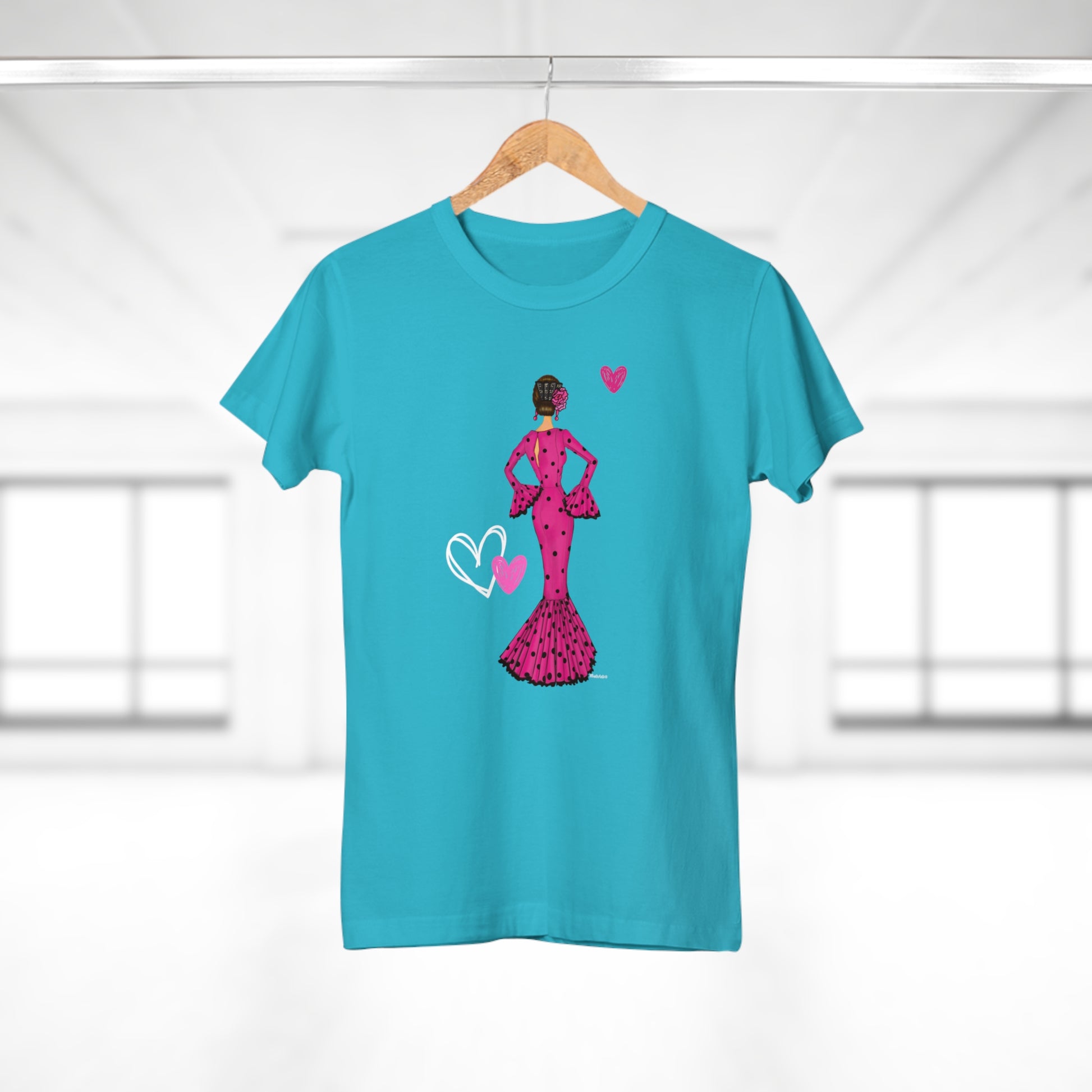 a t - shirt with a woman in a pink dress holding a heart