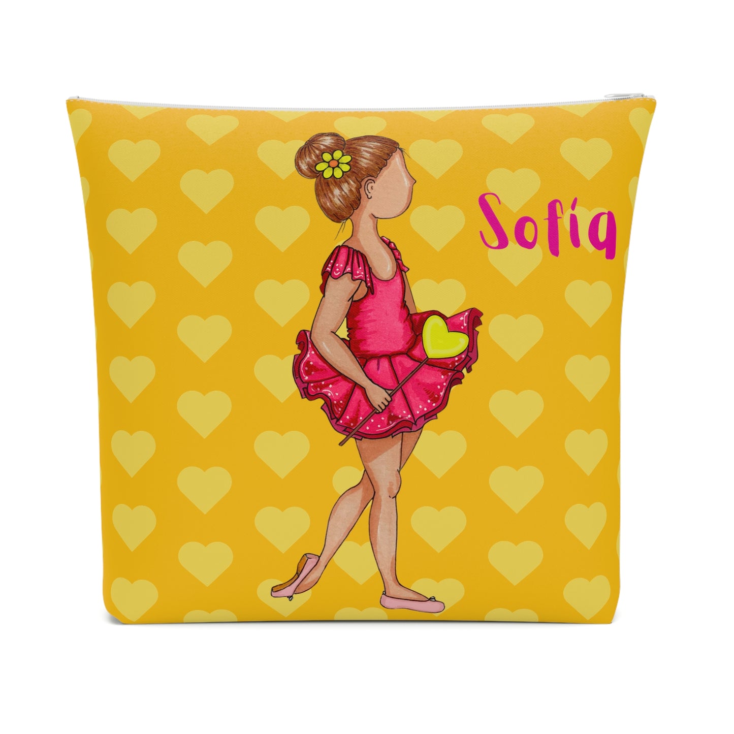 a yellow pillow with a picture of a girl in a pink dress