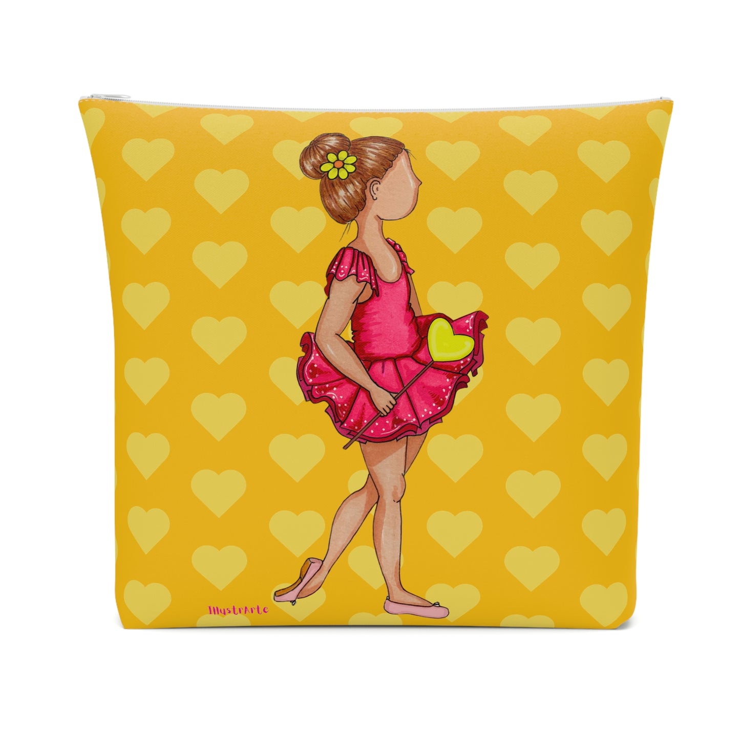 a yellow pillow with a little girl in a pink dress