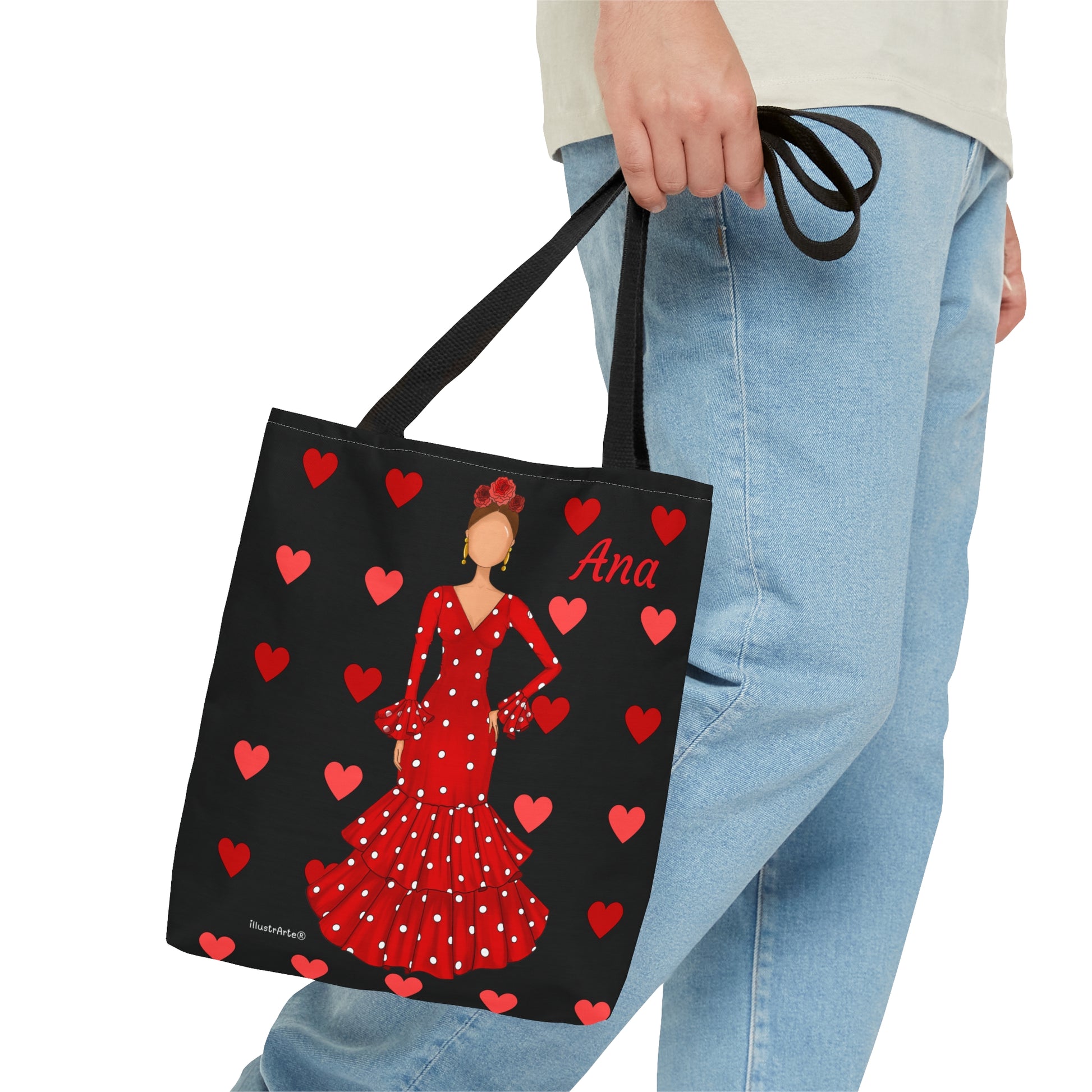 una mujer llevando una bolsa negra con corazones rojos