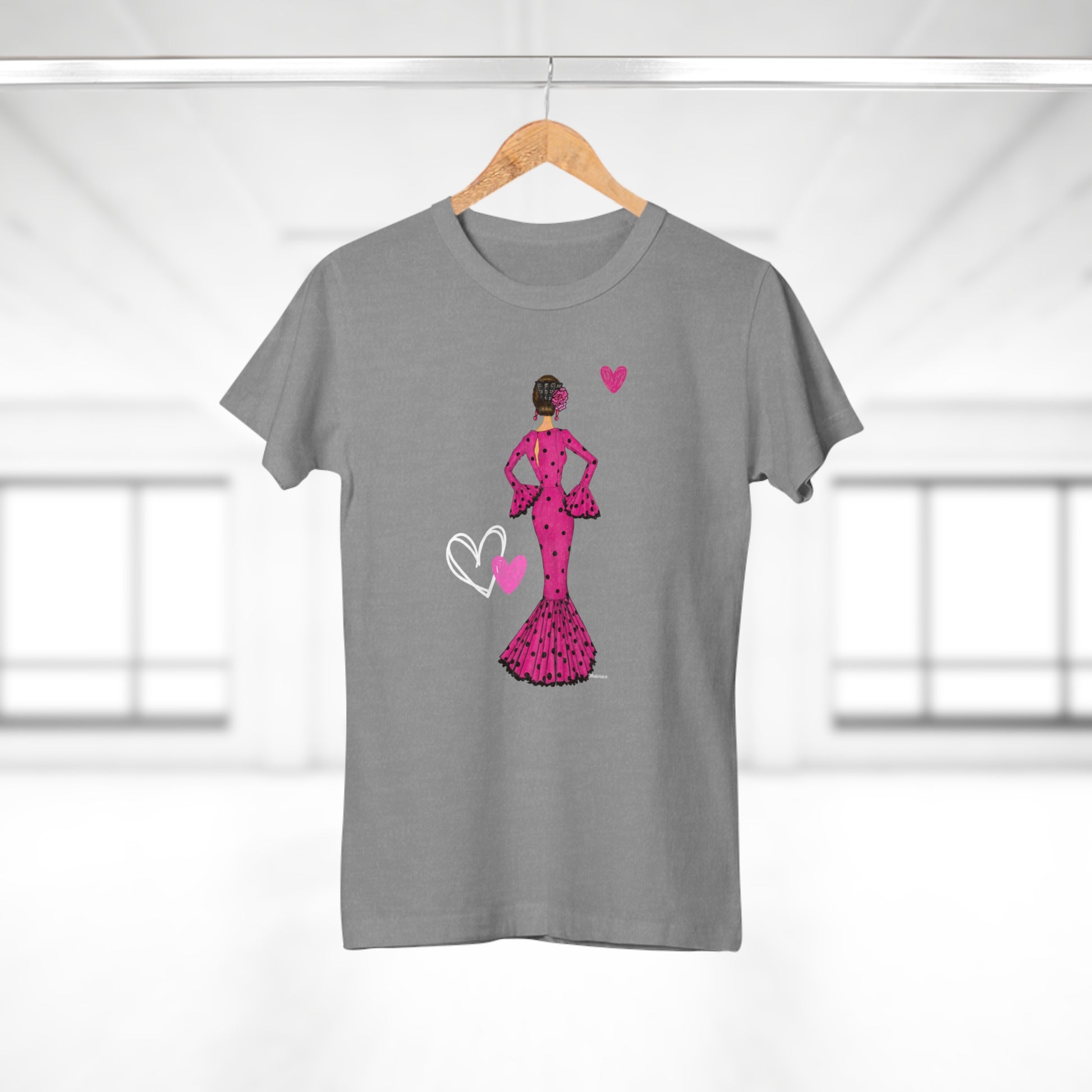 a t - shirt with a woman in a pink dress holding a heart