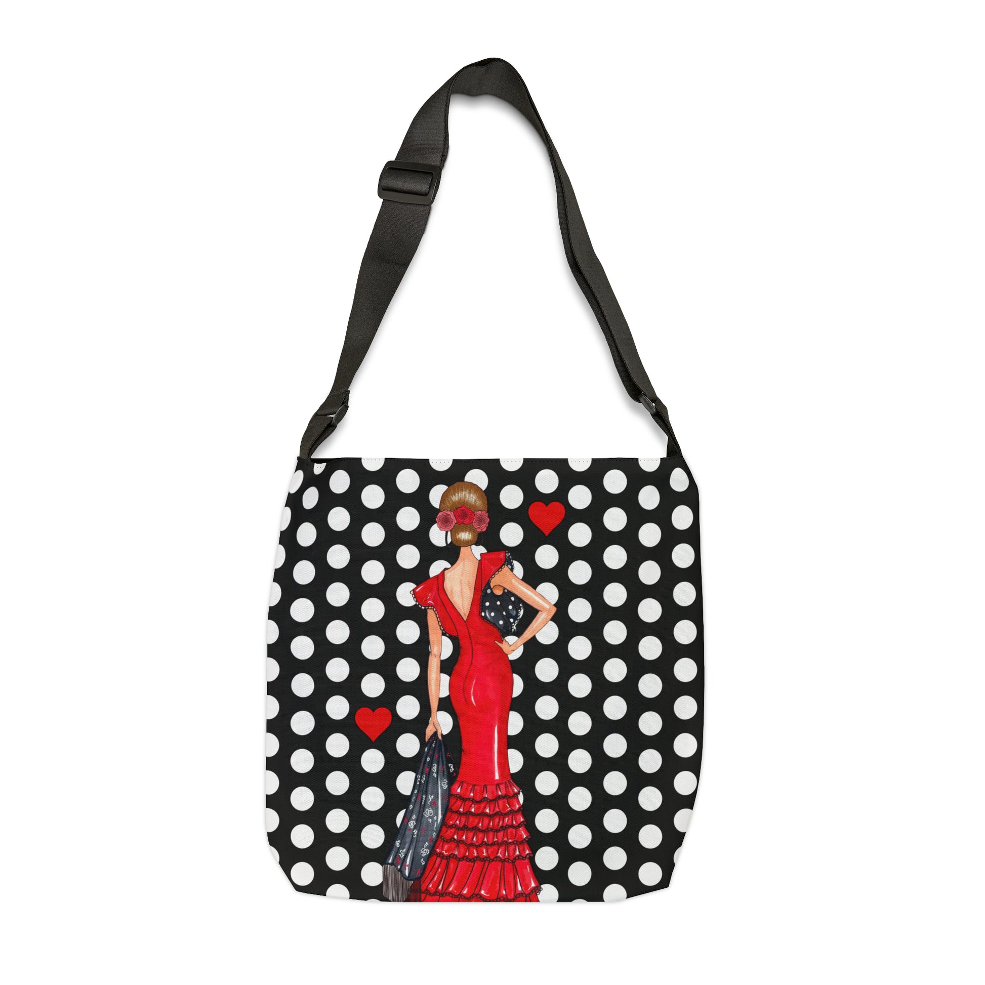 a black and white polka dot bag with a woman in a red dress