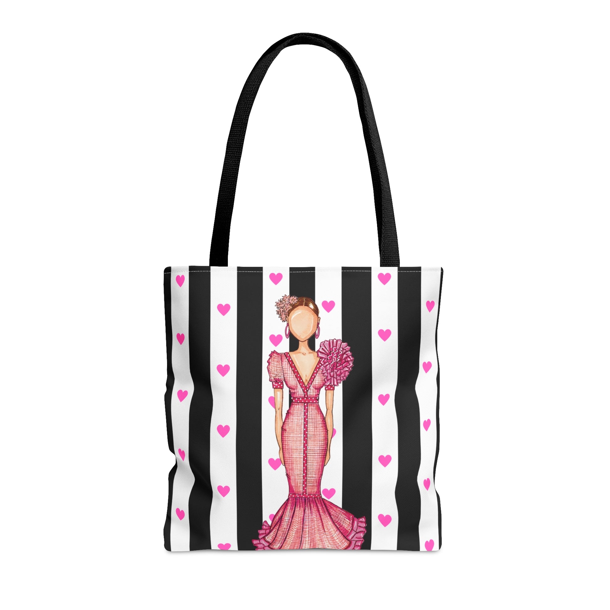 a black and white striped bag with a woman in a pink dress