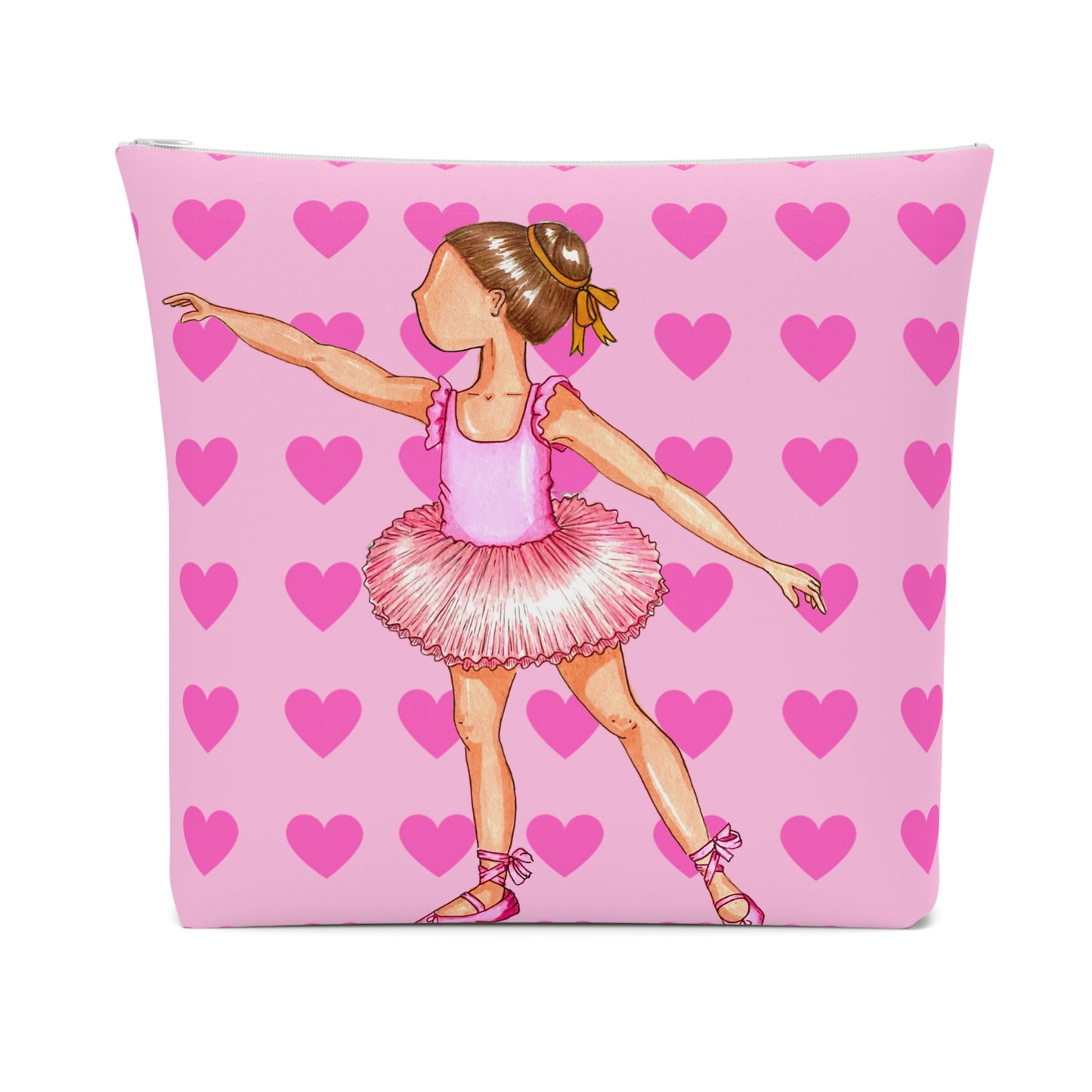 a pink pillow with a little girl in a tutu