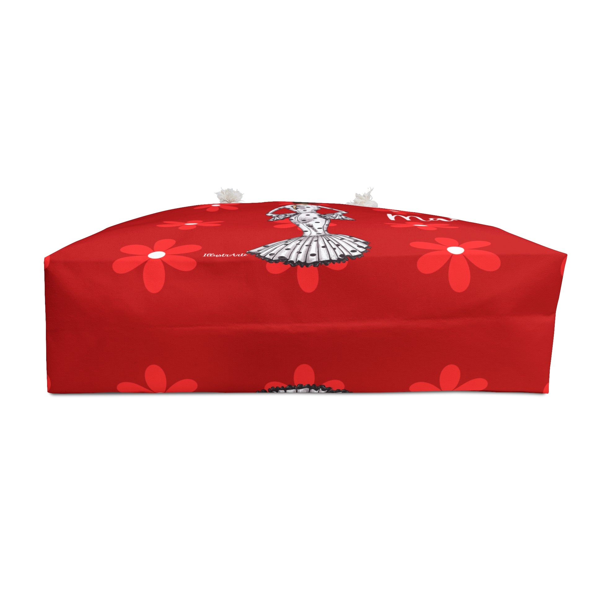 a red table cloth with a flower design on it