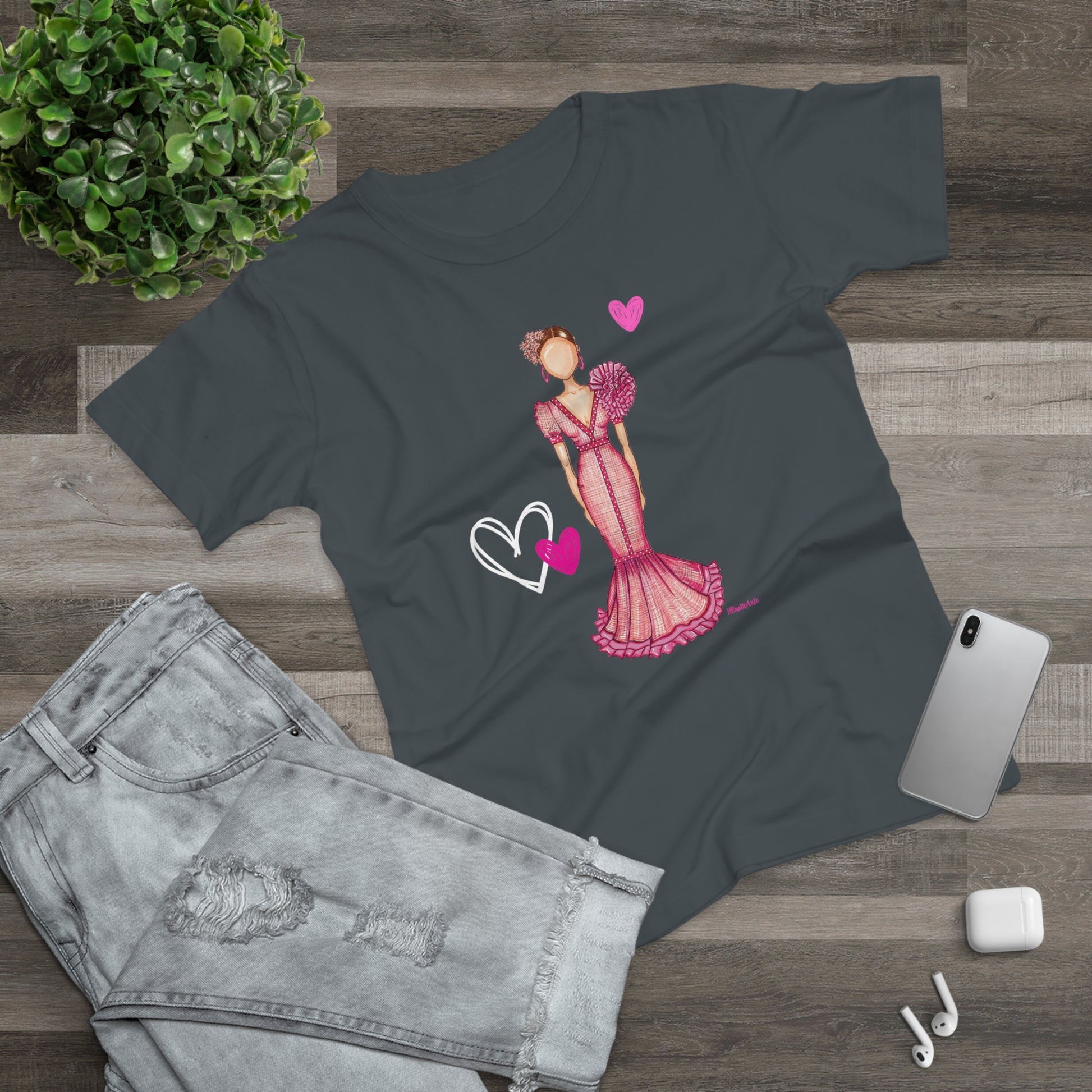 a t - shirt with a picture of a woman in a pink dress