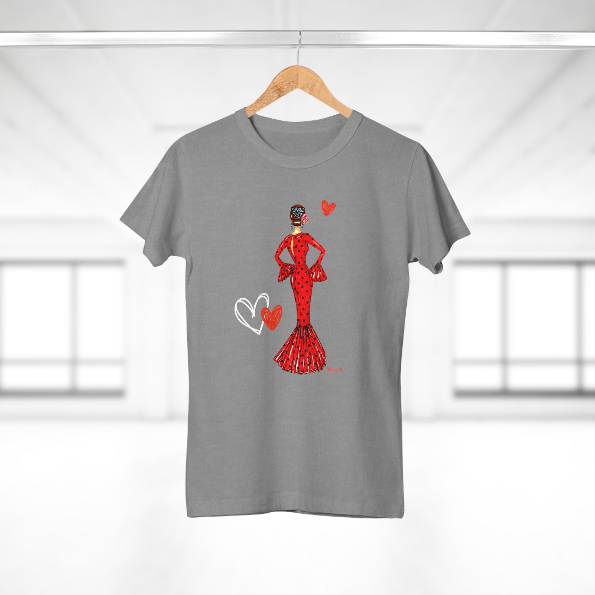 a t - shirt with a woman in a red dress on a hanger