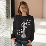 a woman wearing a black jumper with white dots