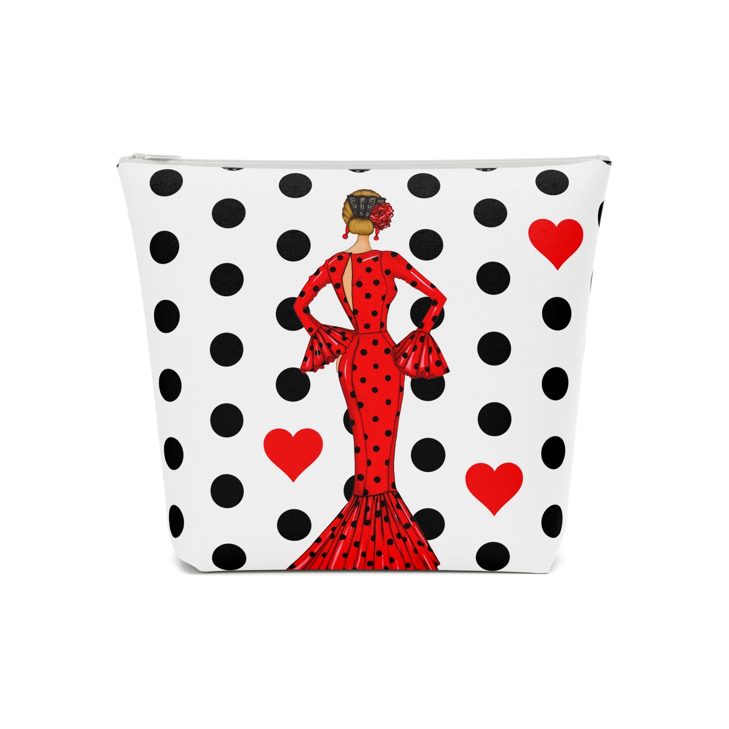 a polka dot purse with a lady in a red dress