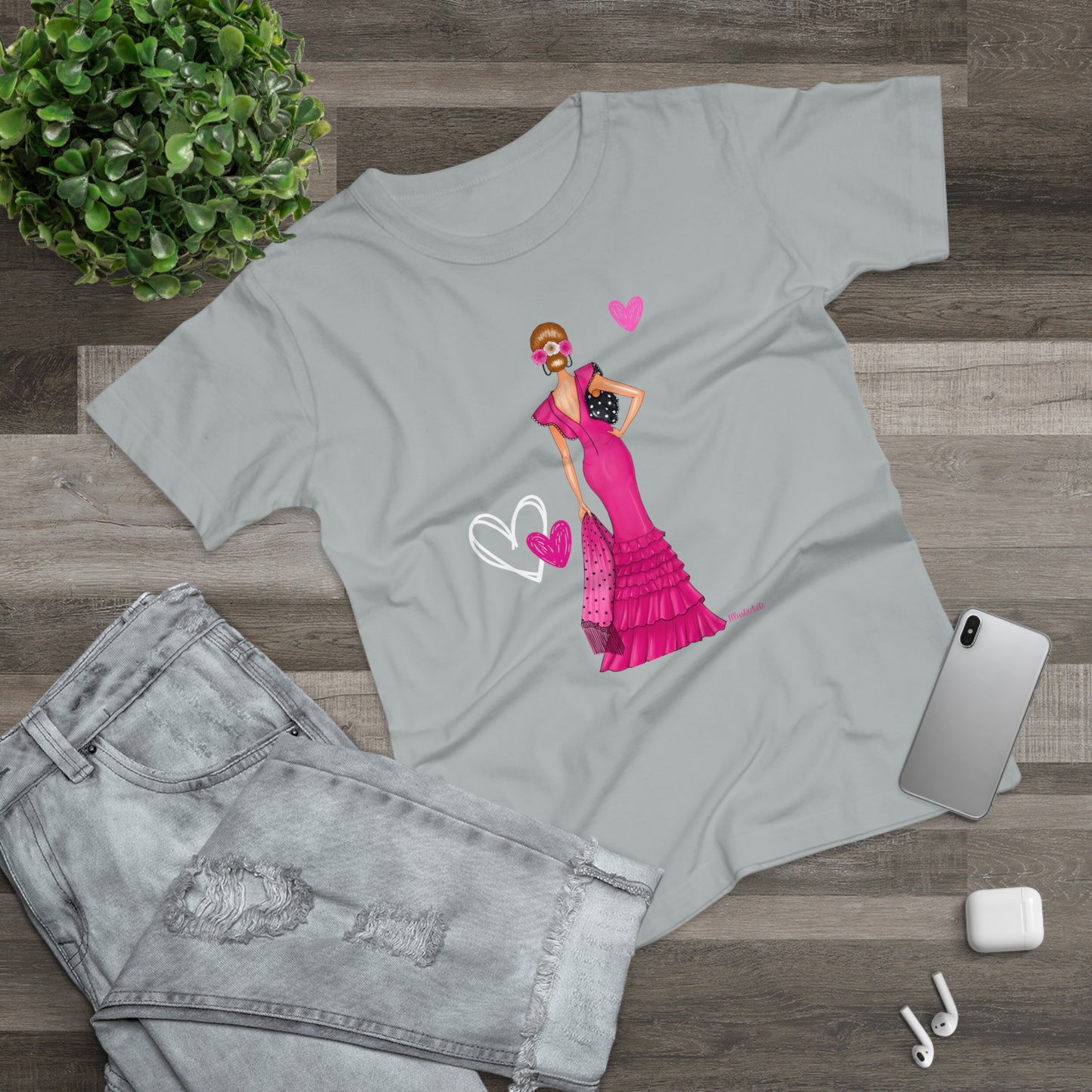 a t - shirt with a picture of a woman in a pink dress