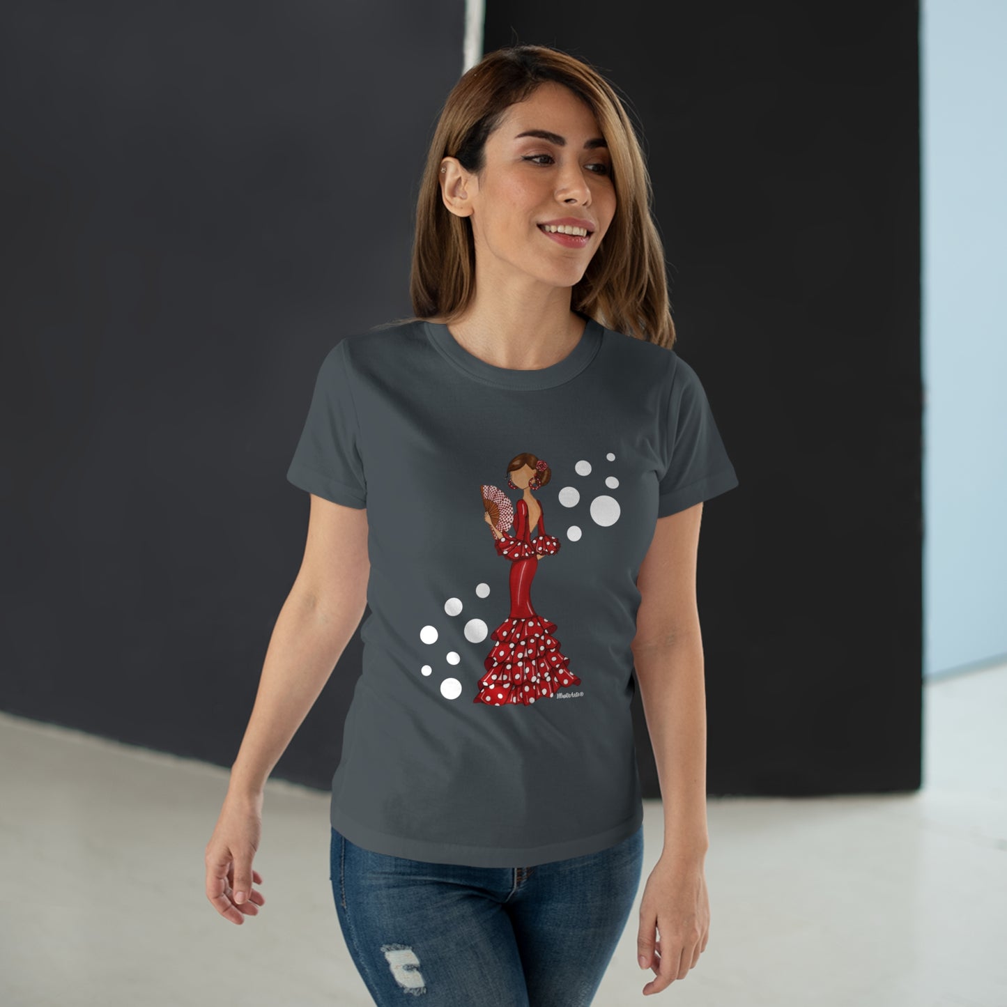 a woman wearing a t - shirt with a design of a woman in a red