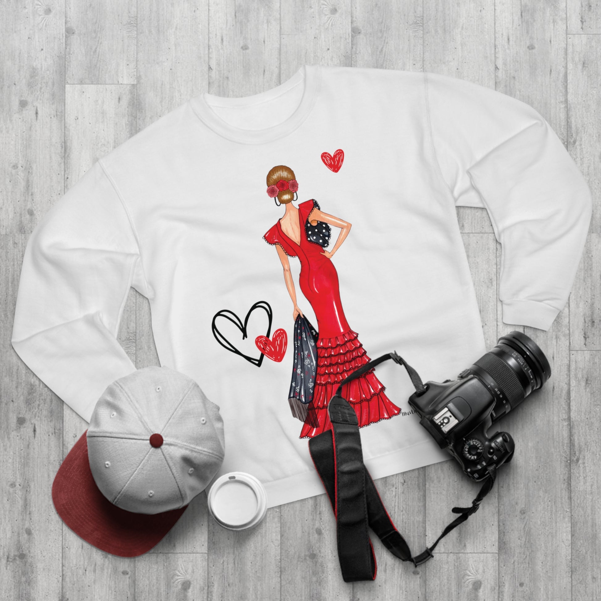 a white shirt with a picture of a woman in a red dress