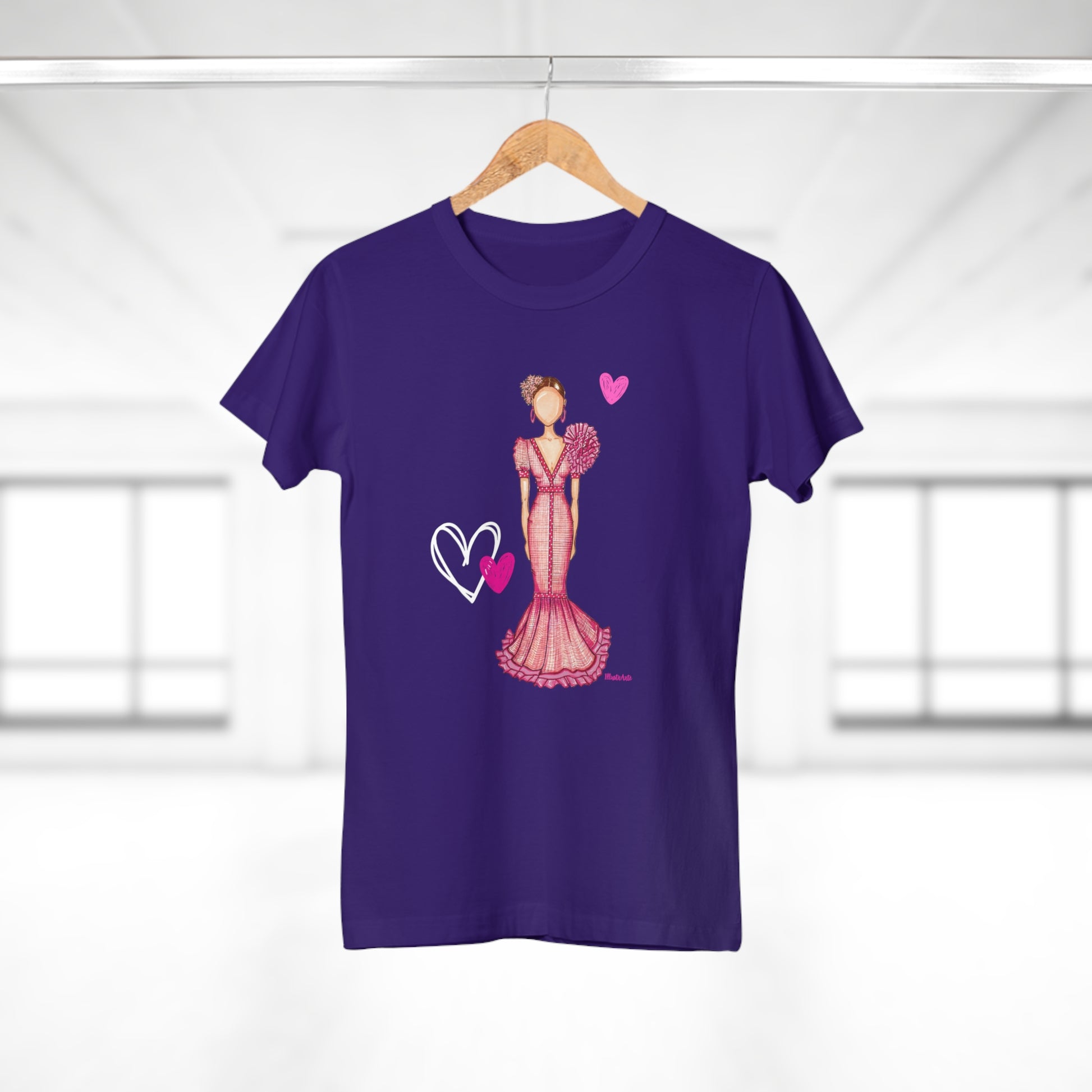 a purple t - shirt with a picture of a woman in a dress