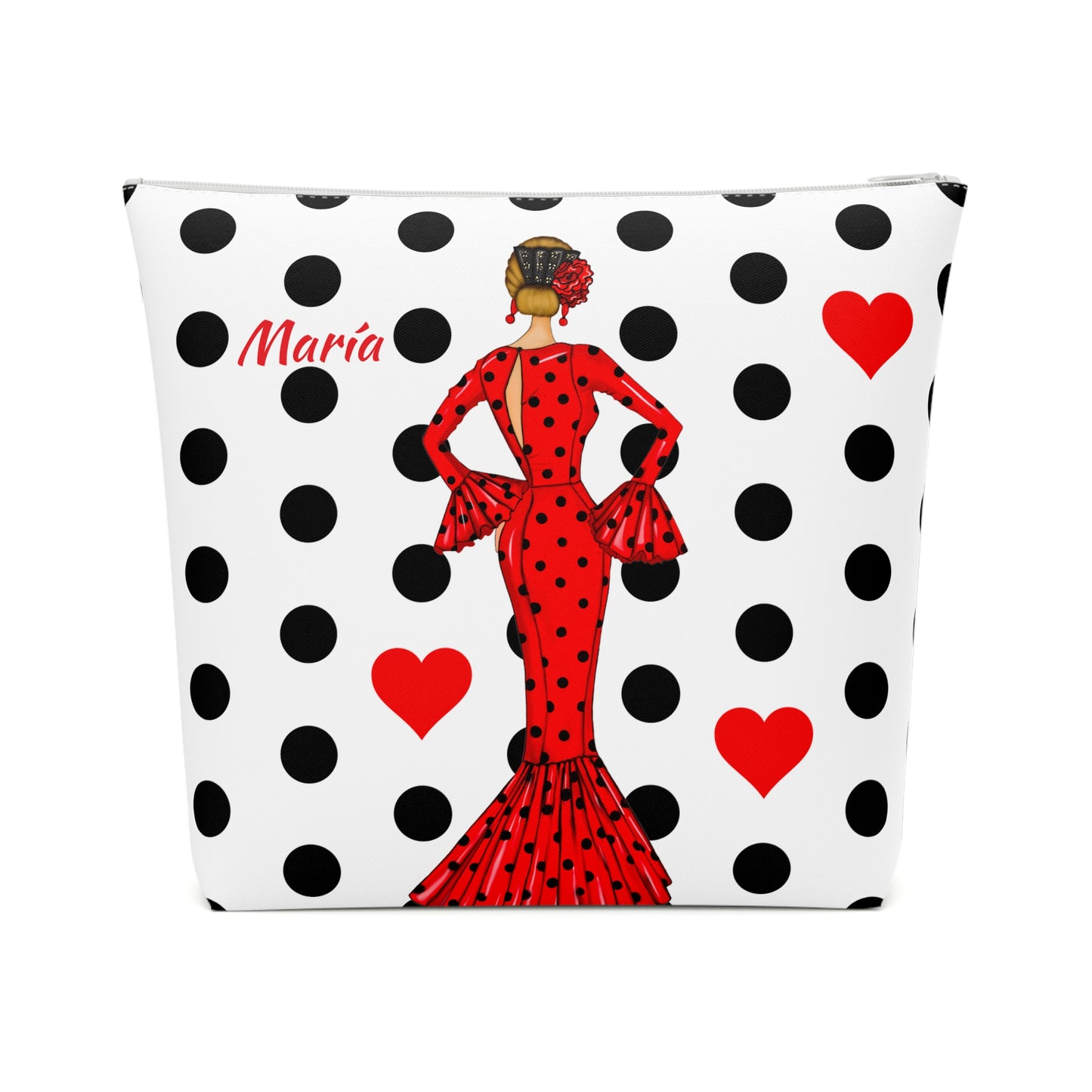 a black and white polka dot bag with a lady in a red dress