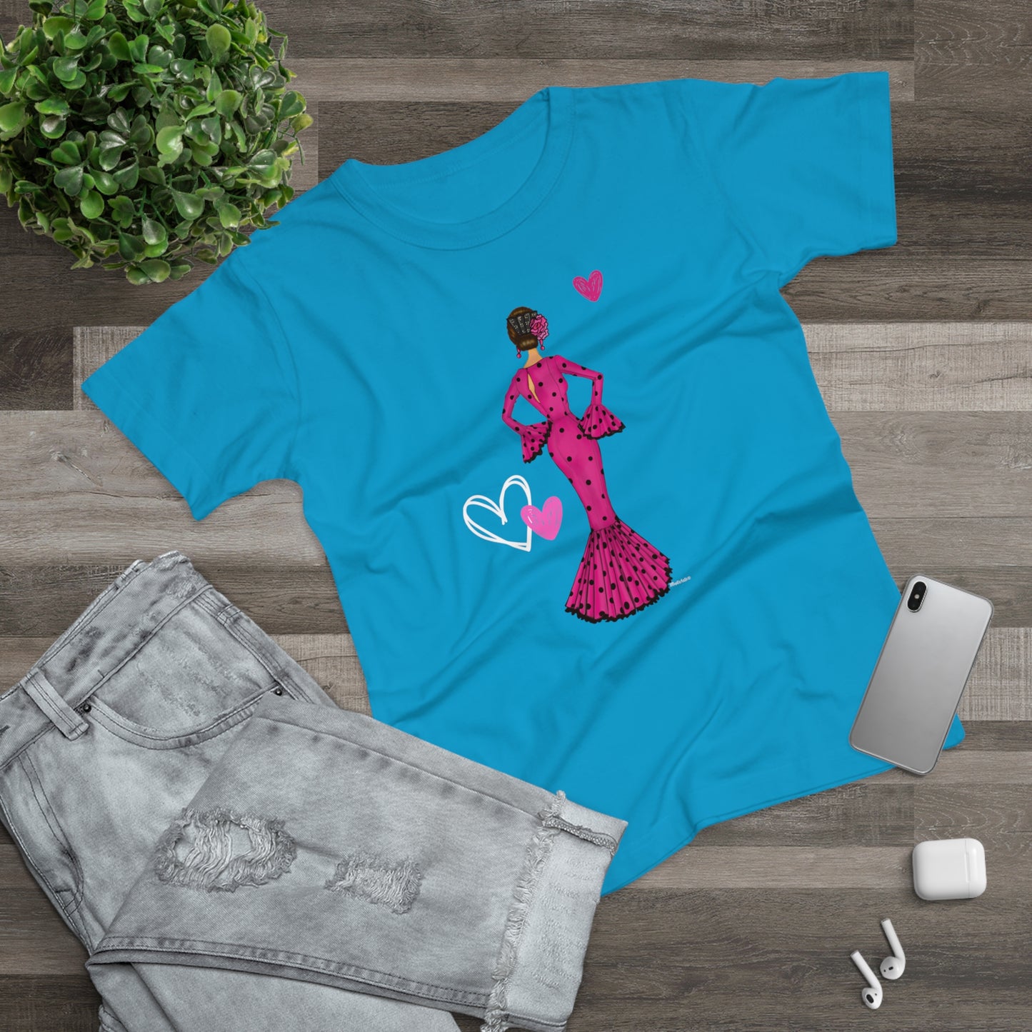 a t - shirt with a picture of a woman in a pink dress