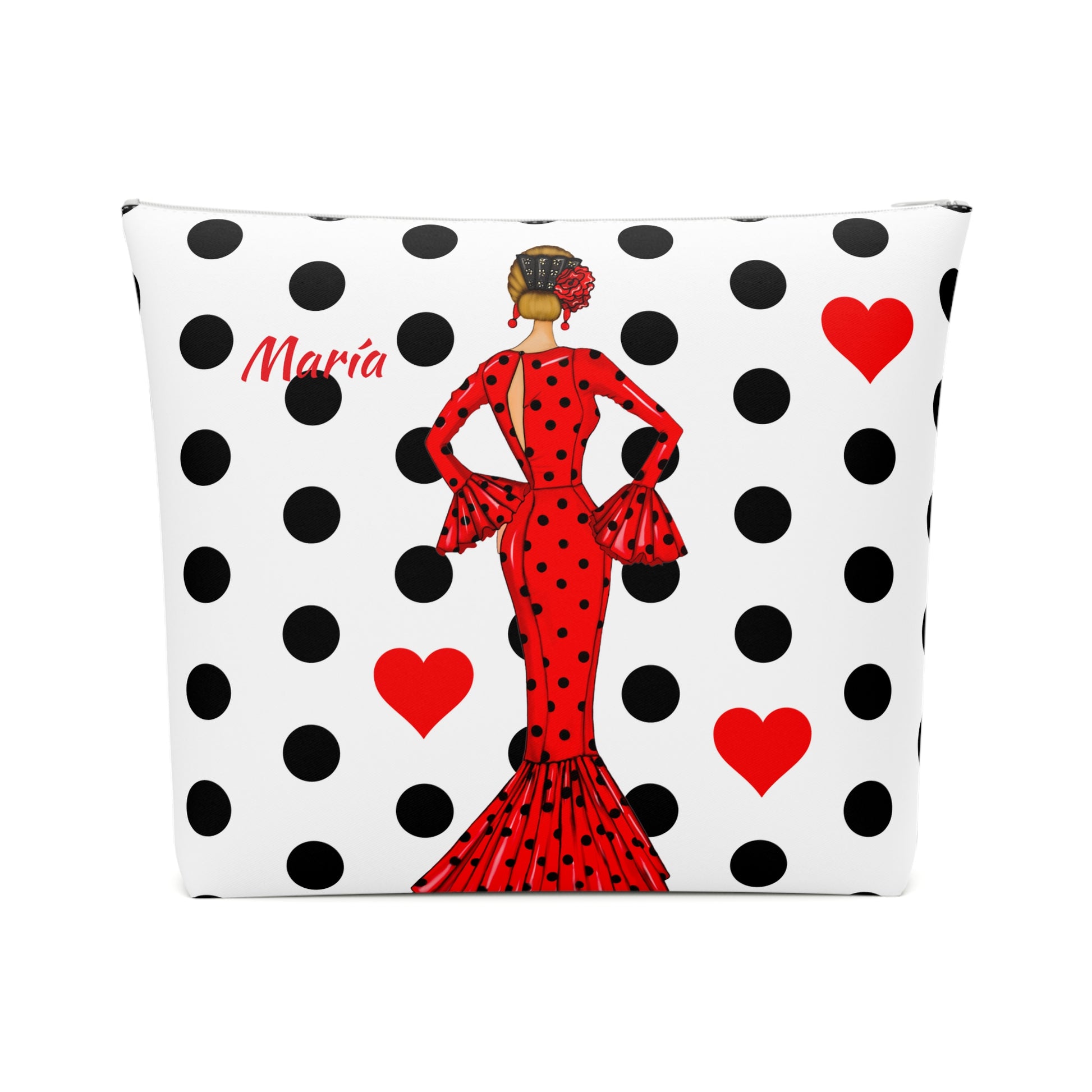 a black and white polka dot pillow with a lady in a red dress