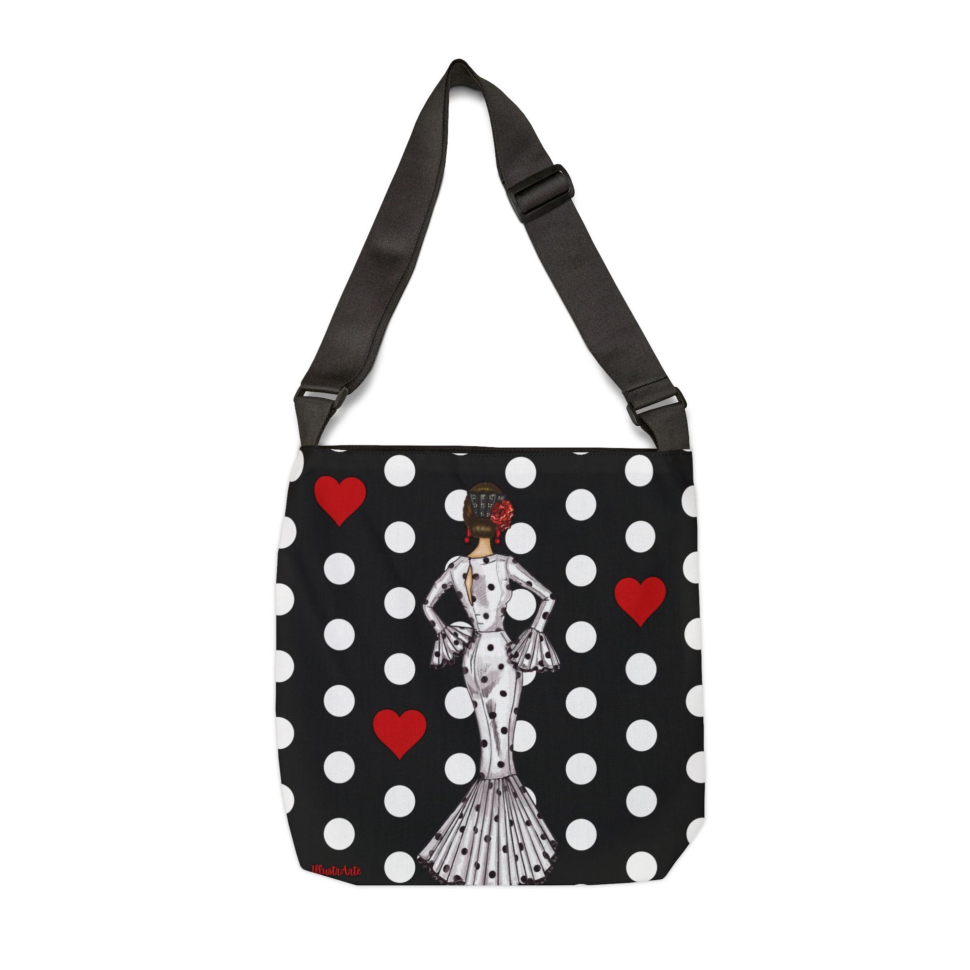 a black and white polka dot bag with a picture of a woman on it