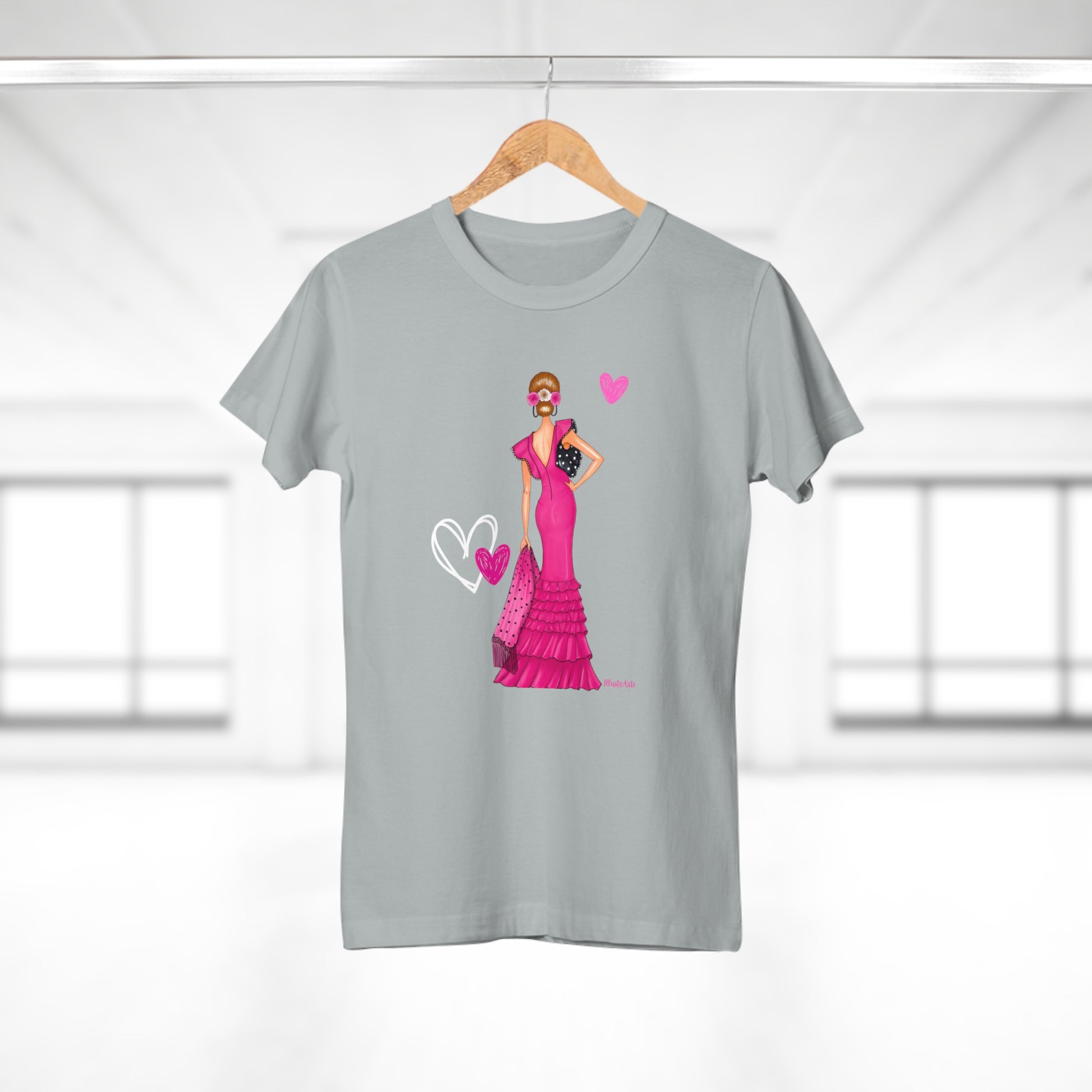 a t - shirt with a picture of a woman in a pink dress