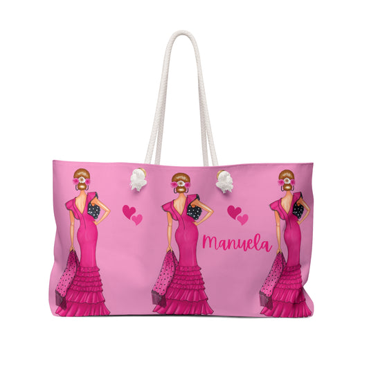 a pink bag with a picture of a woman in a pink dress