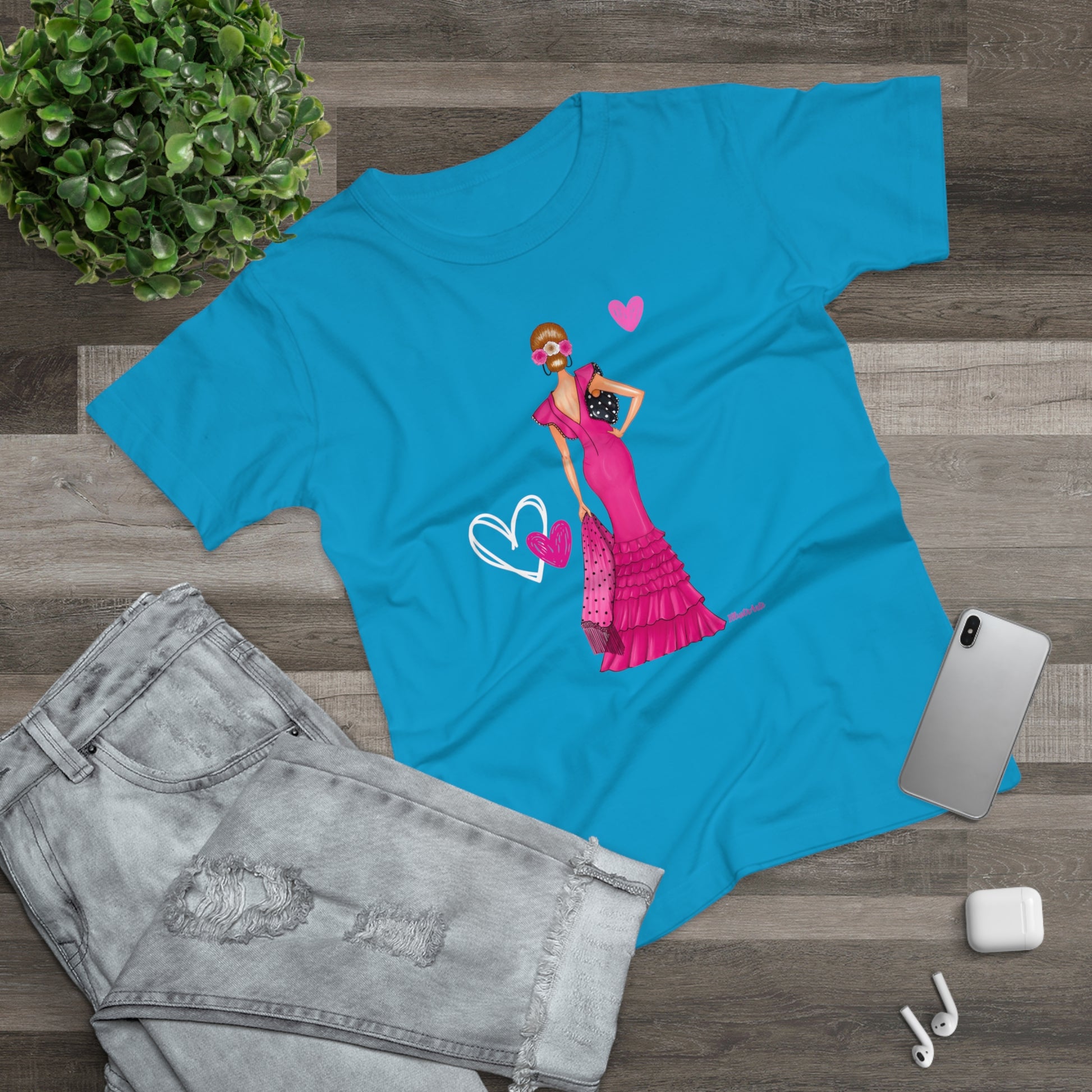 a t - shirt with a picture of a woman in a pink dress