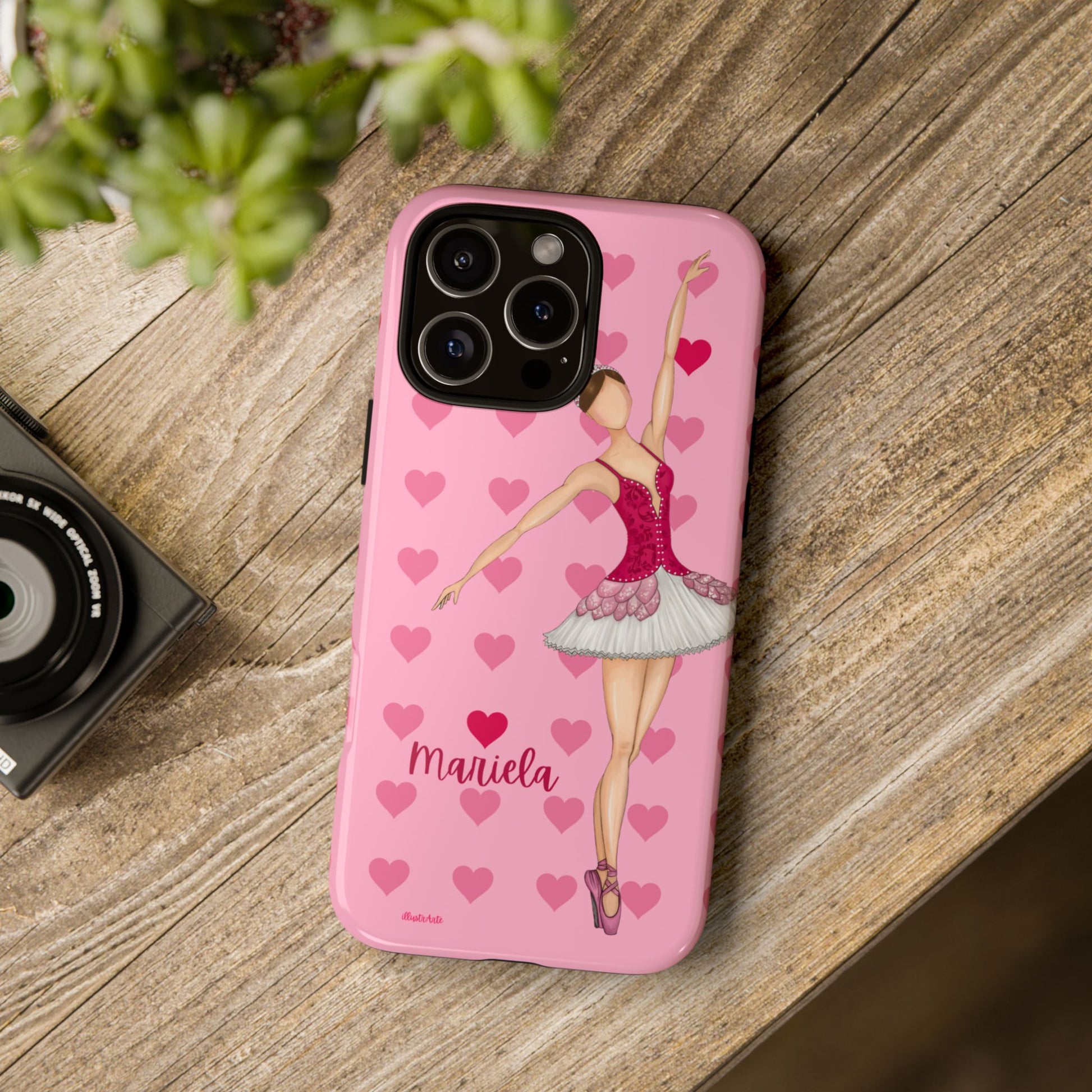 una funda de teléfono rosa con una bailarina en ella