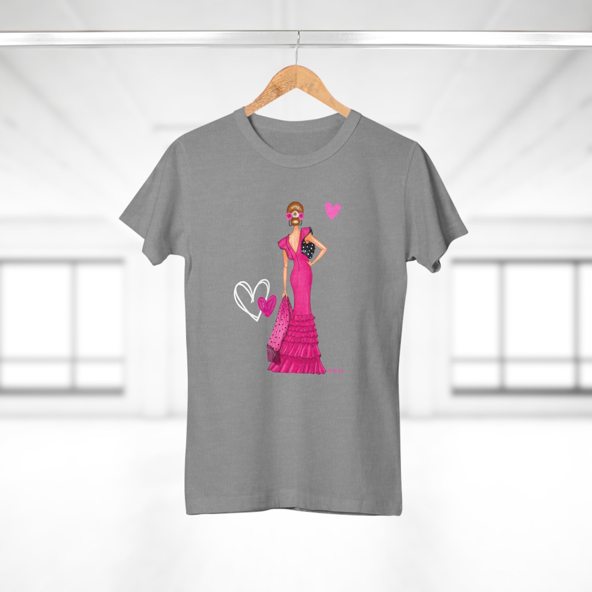 a t - shirt with a picture of a woman in a pink dress