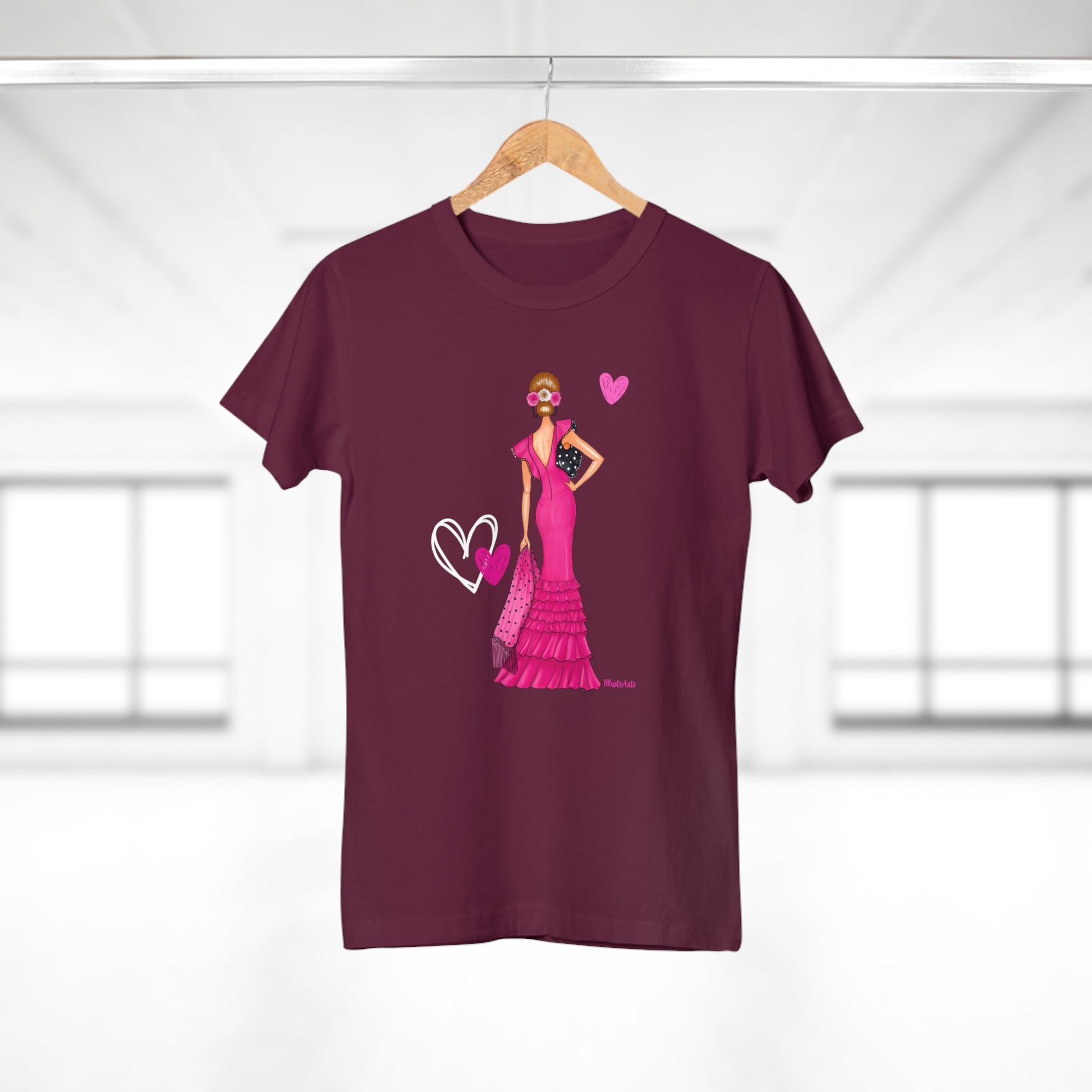 a t - shirt with a picture of a woman in a pink dress