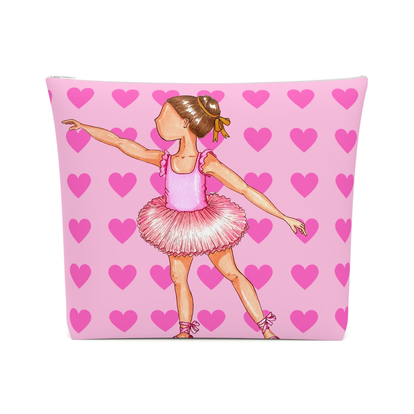 a pink pillow with a little girl in a pink tutu