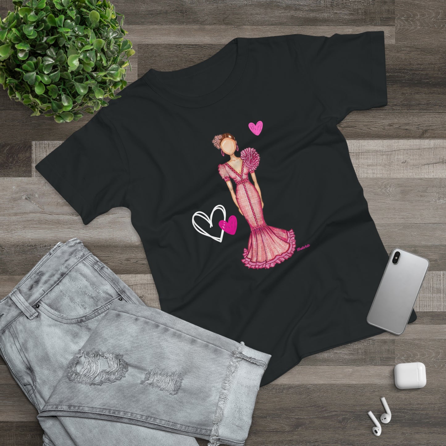 a t - shirt with a picture of a woman in a pink dress