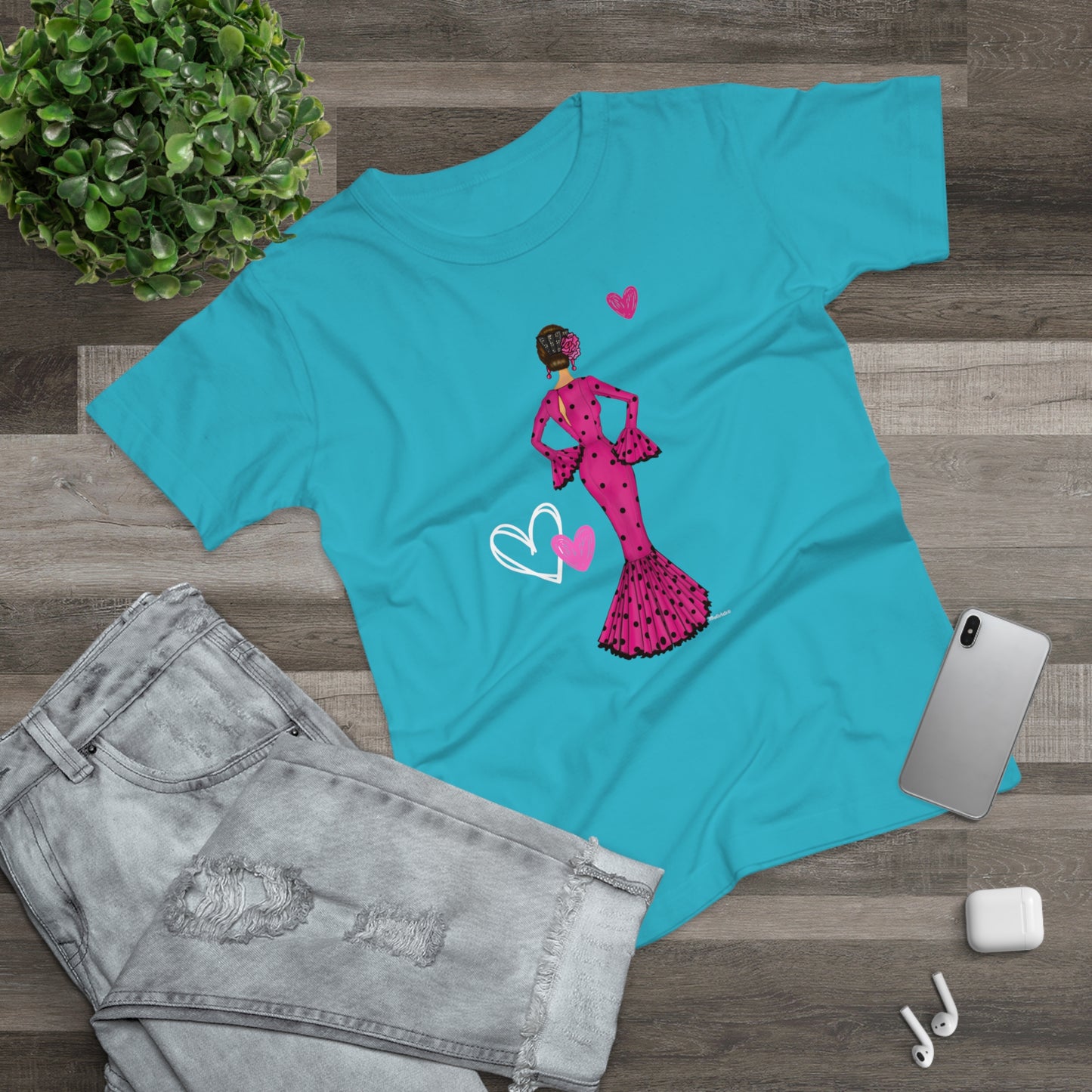 a t - shirt with a picture of a woman in a pink dress