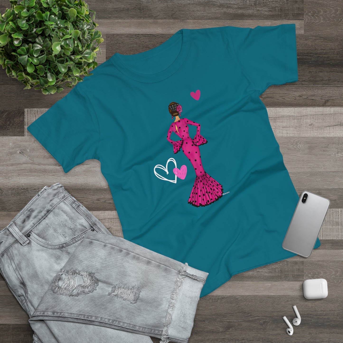 a t - shirt with a picture of a woman in a pink dress