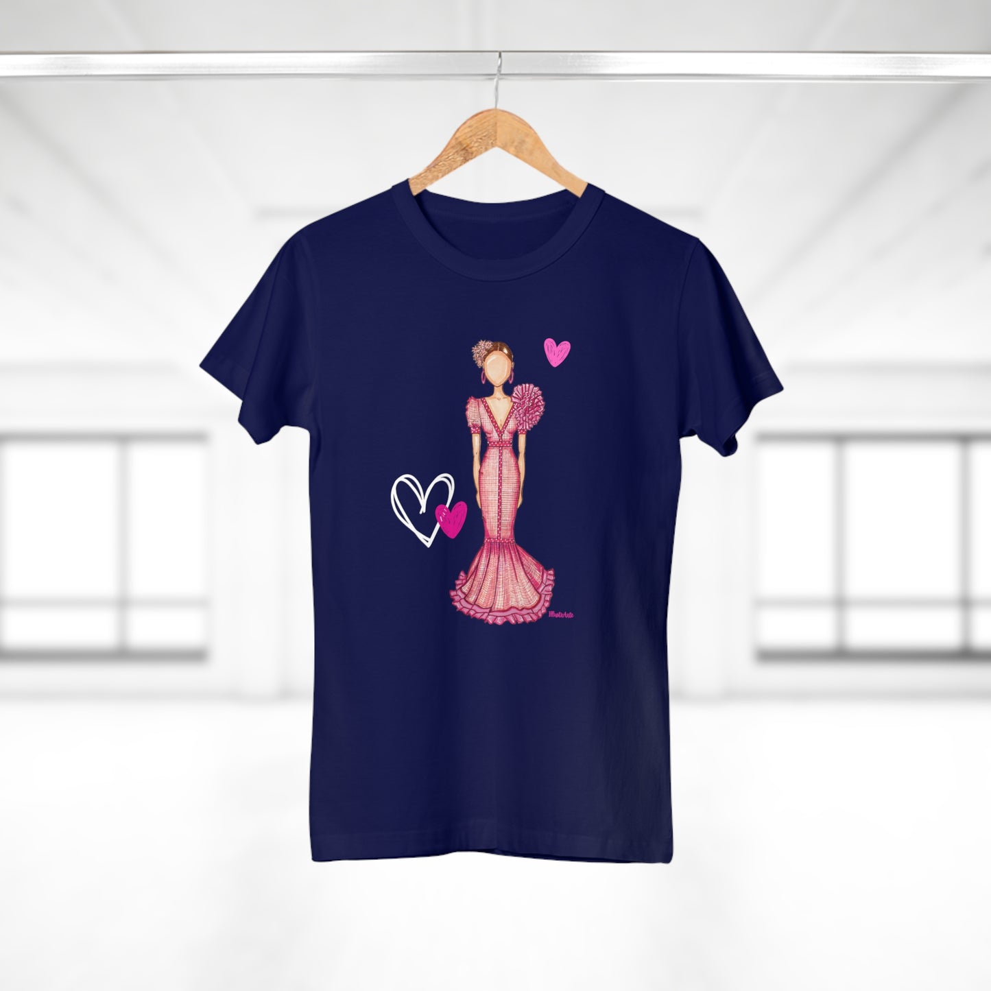 a t - shirt with a woman in a pink dress on a hanger