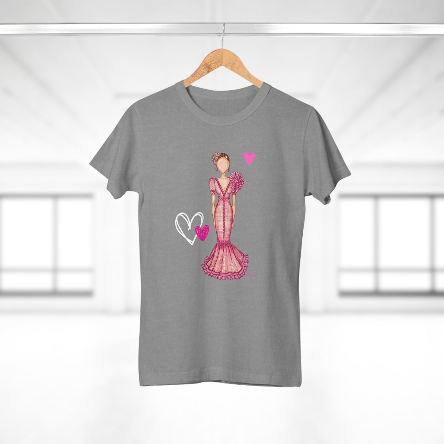 a t - shirt with a woman in a pink dress on a hanger