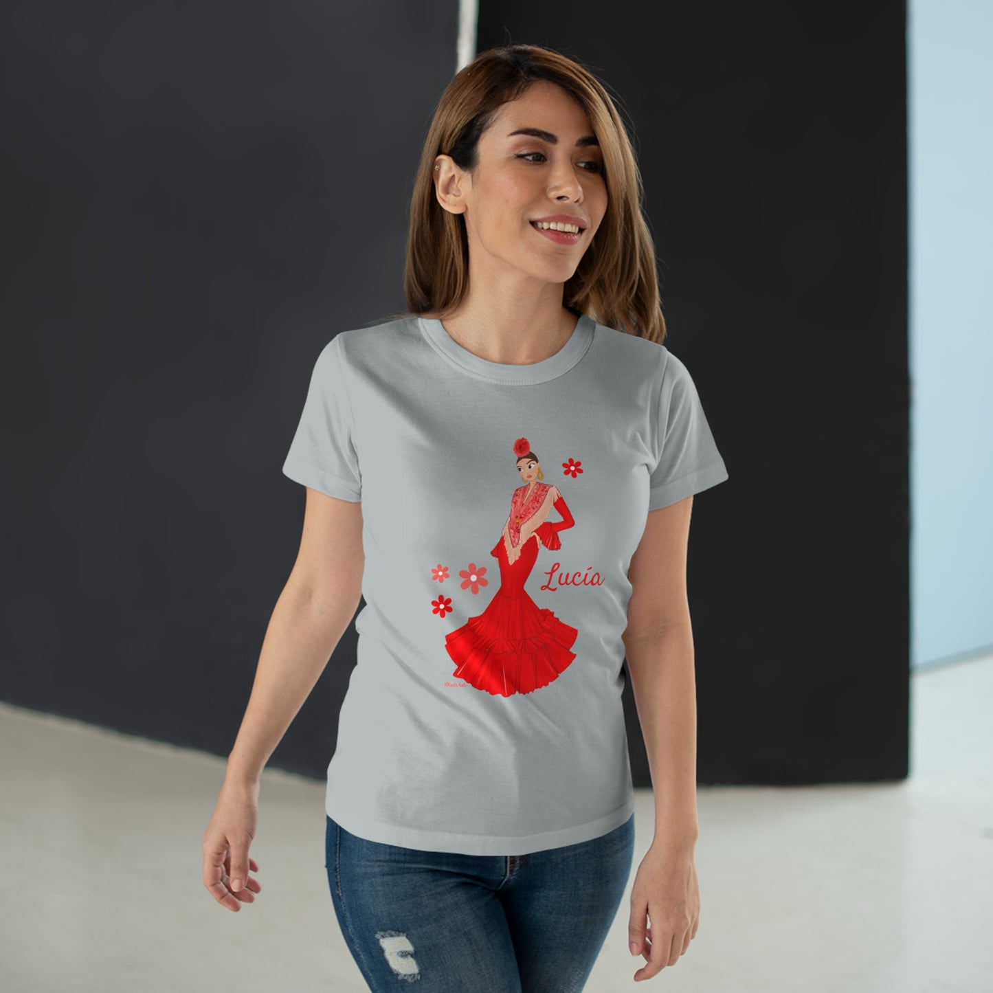 a woman wearing a t - shirt with a picture of a woman in a red