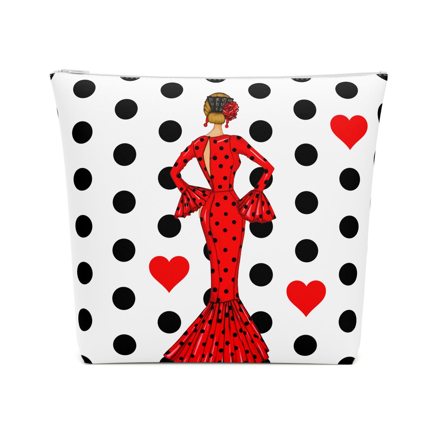 a black and white polka dot purse with a lady in a red dress