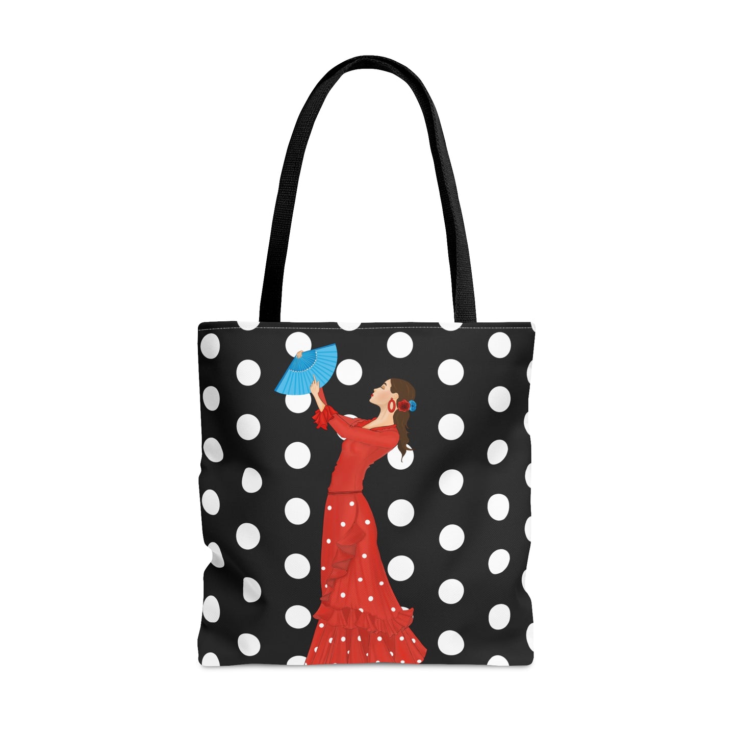 una bolsa de lona de lunares en blanco y negro con una mujer en un vestido rojo