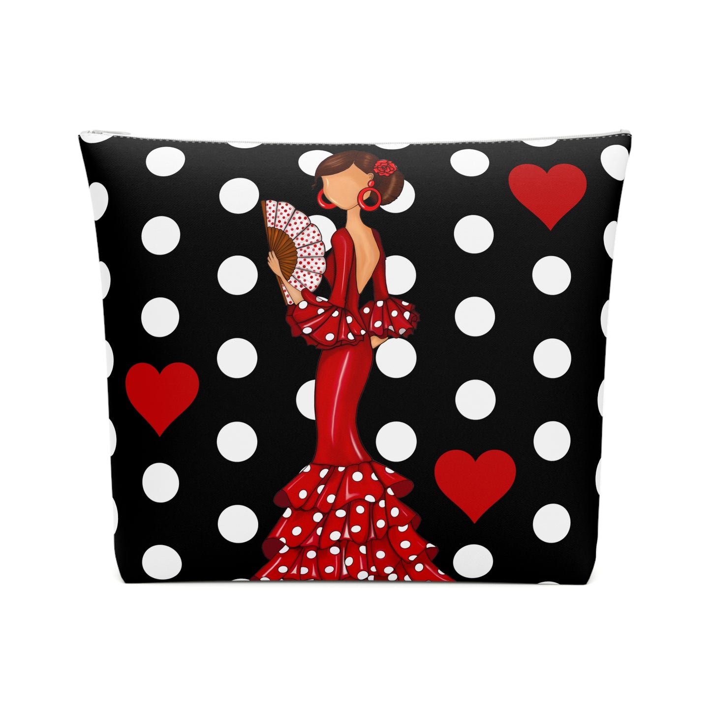 una almohada de lunares en blanco y negro con una mujer en un vestido rojo