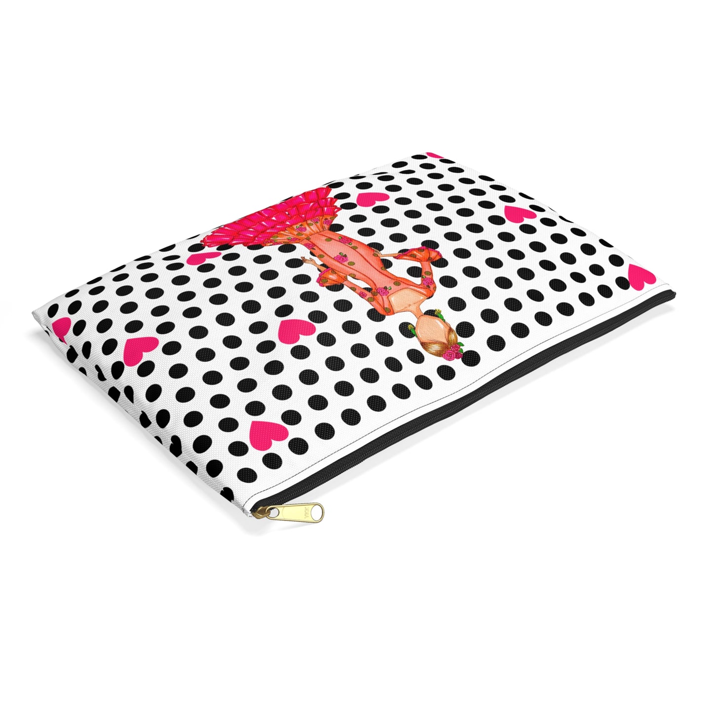 a black and white polka dot notebook with a cartoon character on it