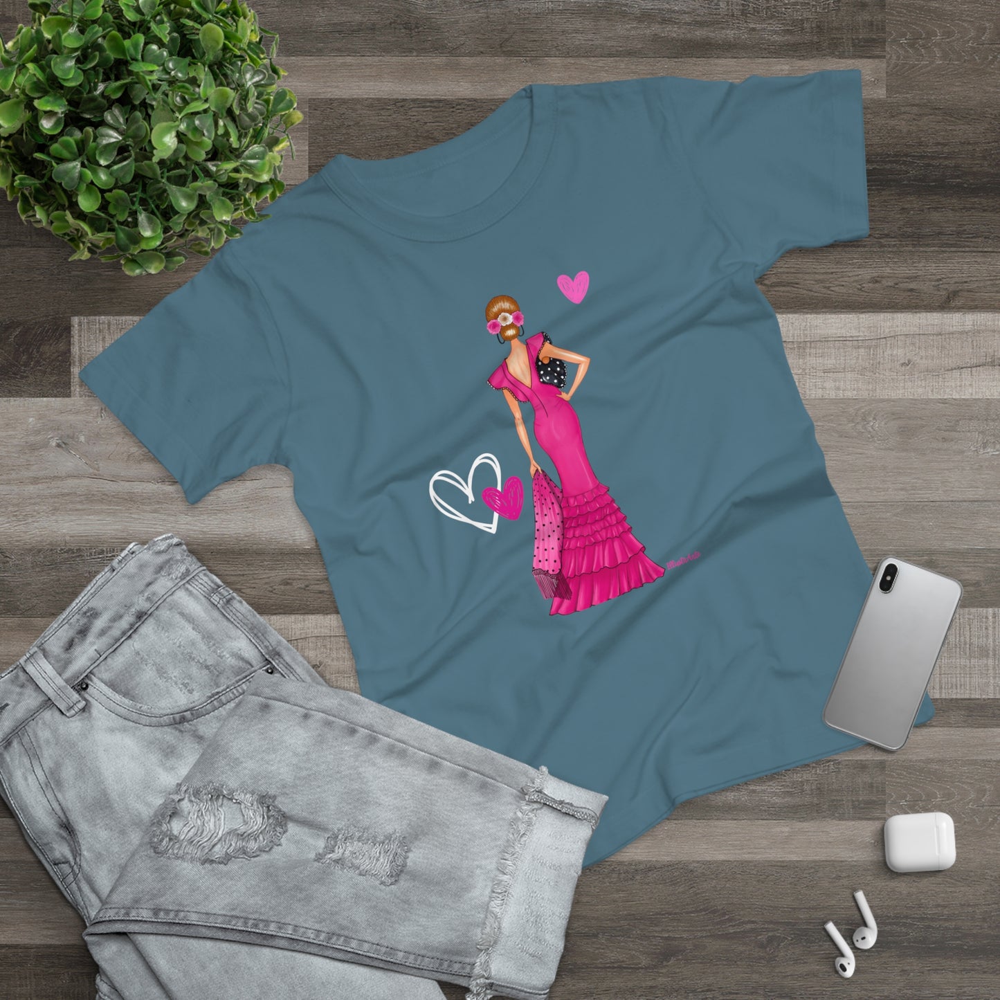 a t - shirt with a picture of a woman in a pink dress