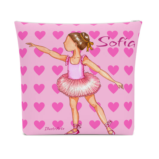 a pink pillow with a picture of a ballerina on it