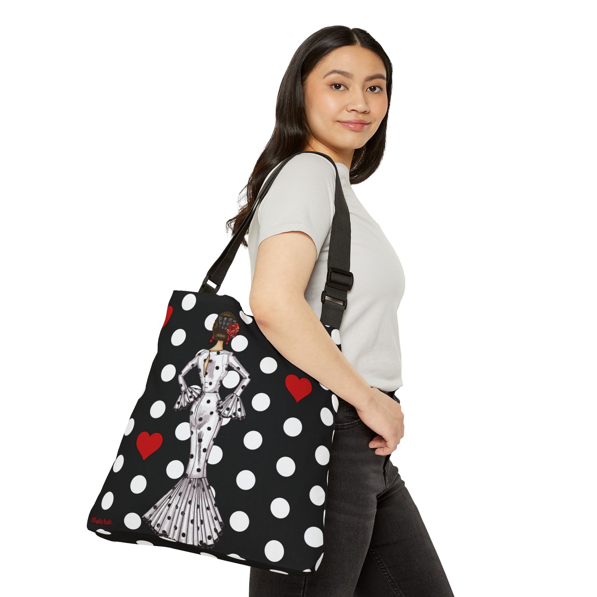 a woman carrying a black and white polka dot purse