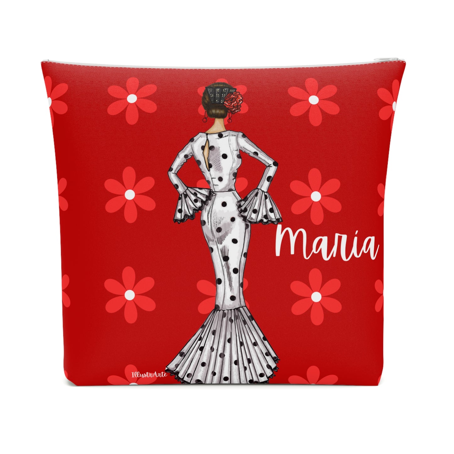 a red pillow with a picture of a woman in a polka dot dress