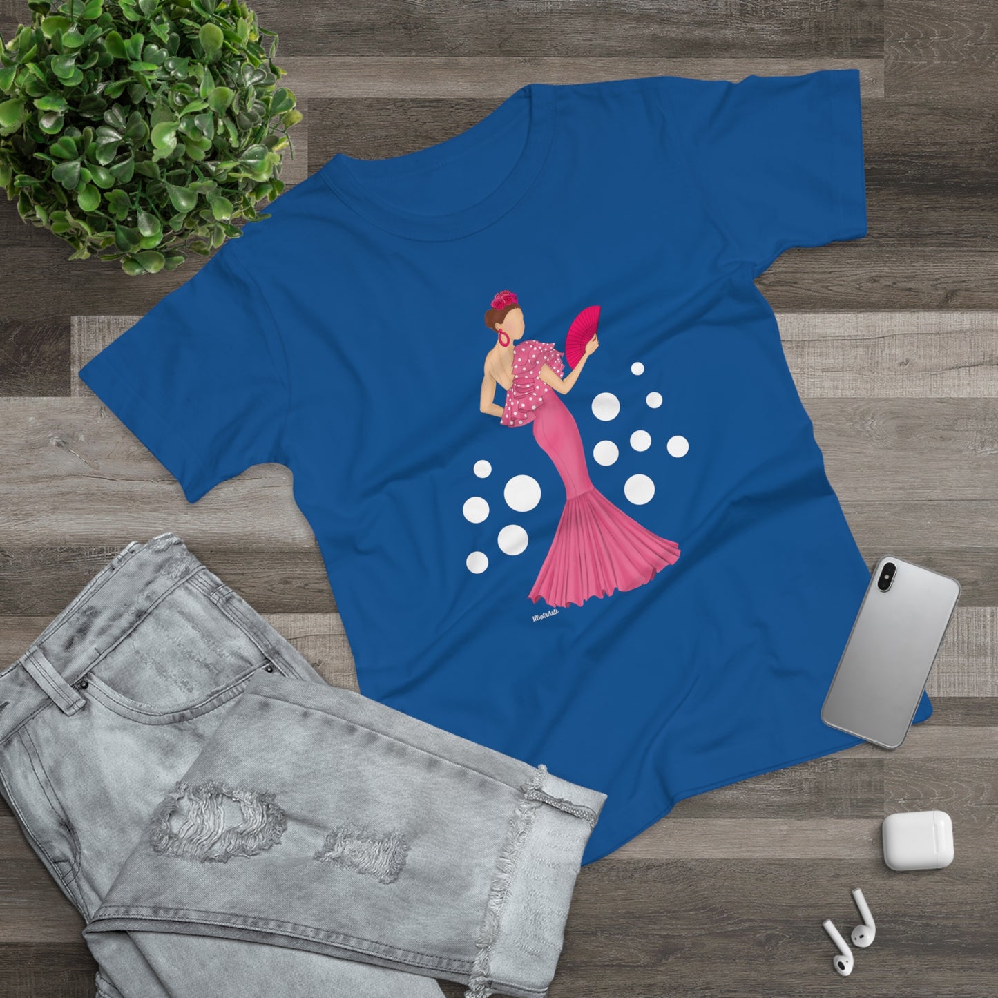 a t - shirt with a picture of a woman in a pink dress