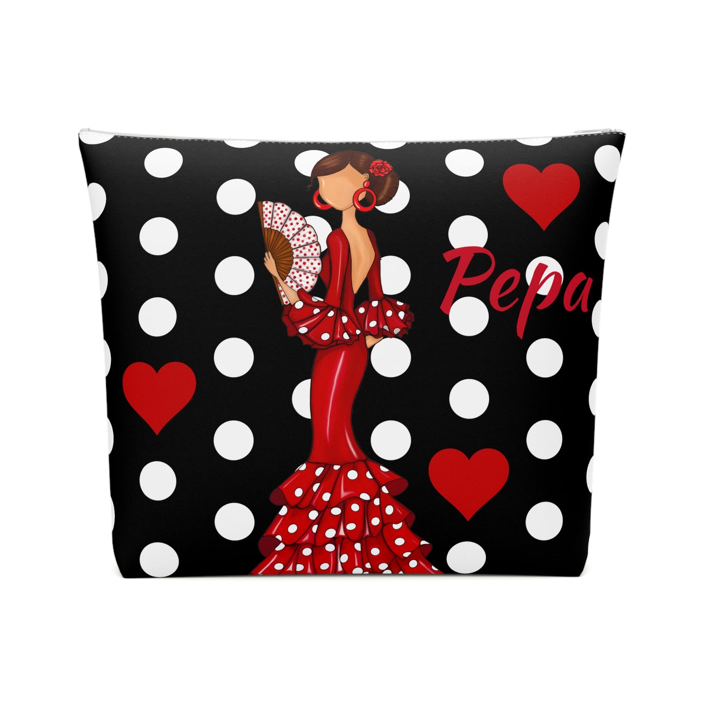 una almohada de lunares en blanco y negro con una mujer en un vestido rojo