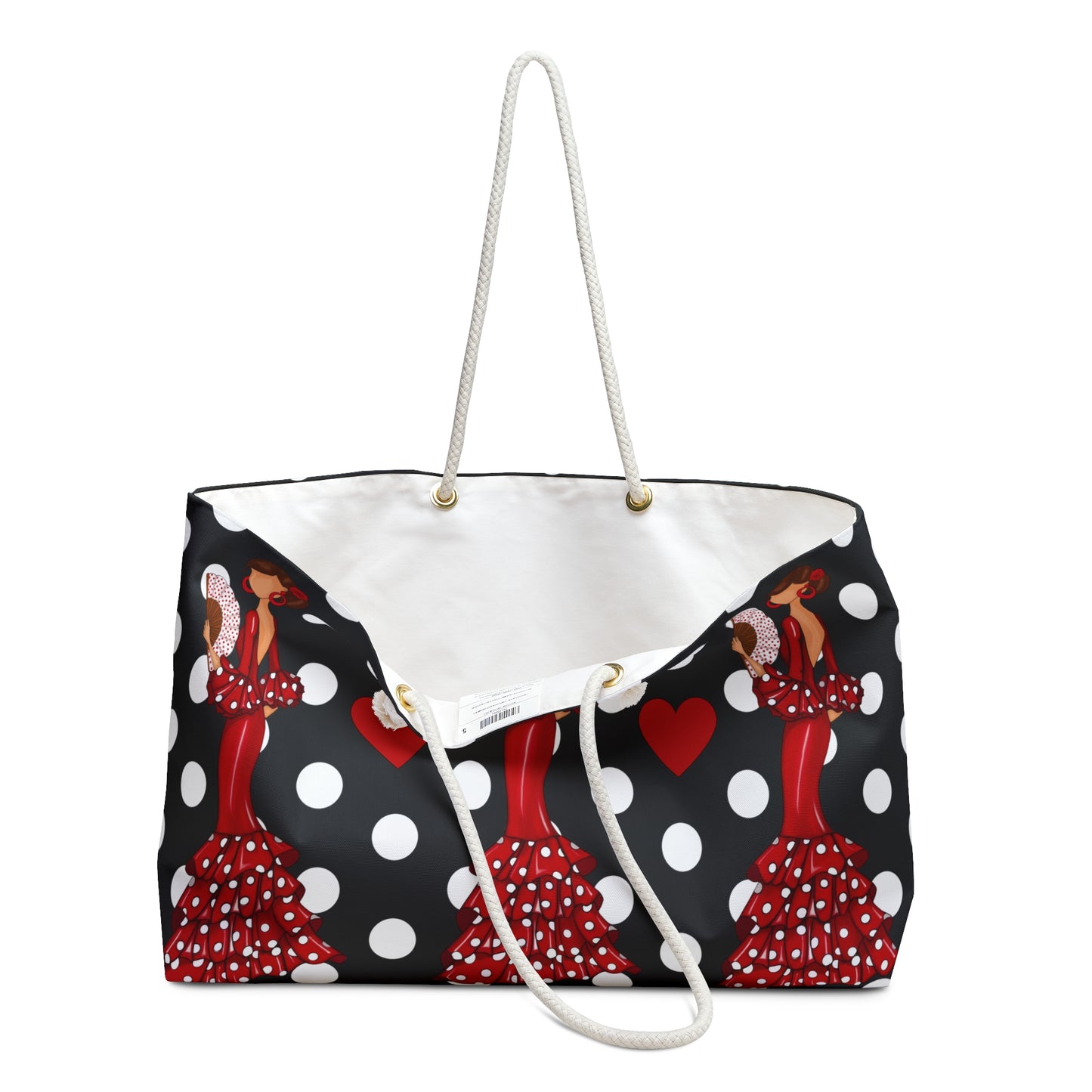 a black and white polka dot purse with a woman in a red dress